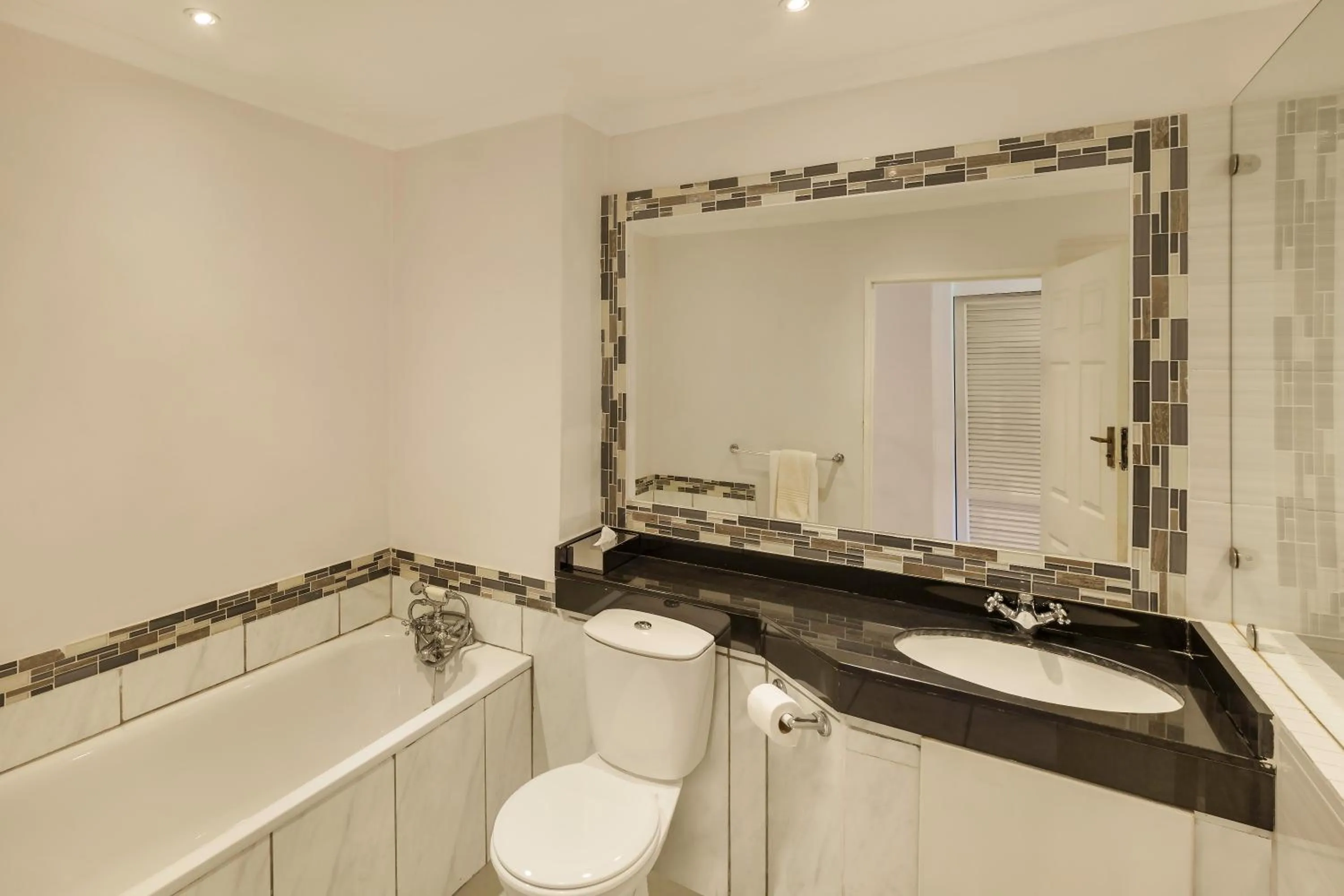Bathroom in Protea Hotel by Marriott Chingola