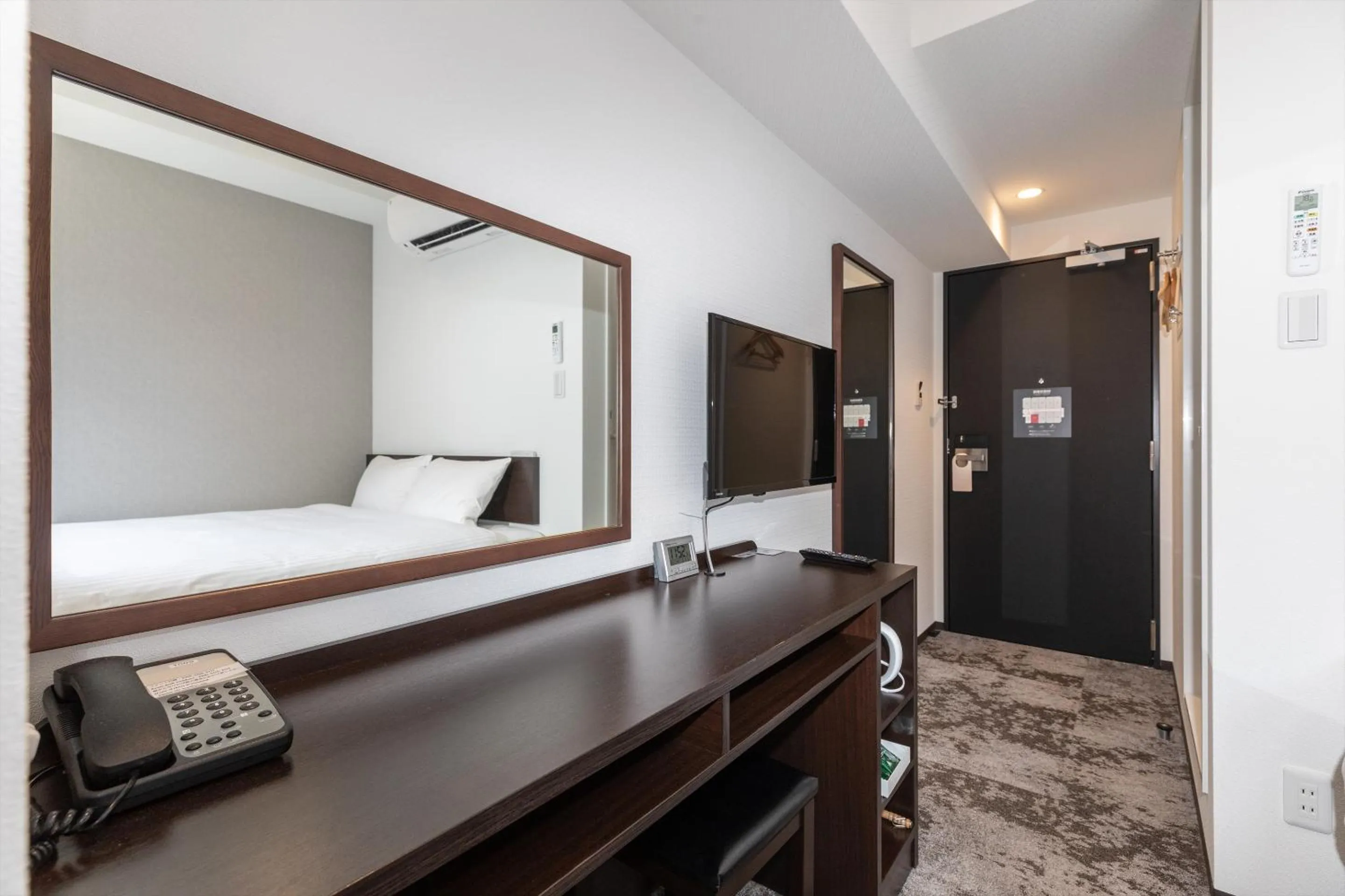 Bed in Hotel Tetora Kyoto Station