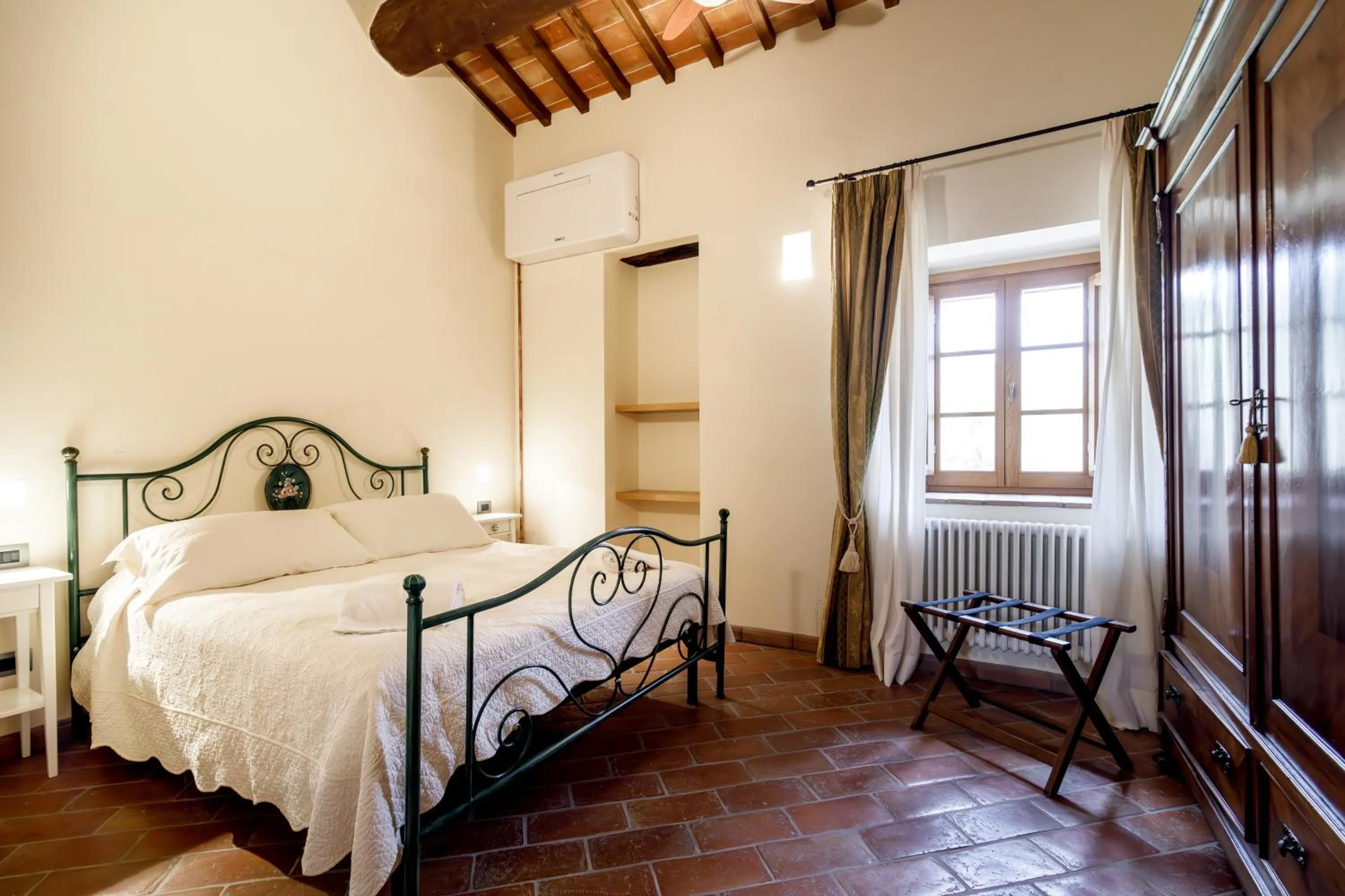 Bed in Relais La Costa Historical Residence