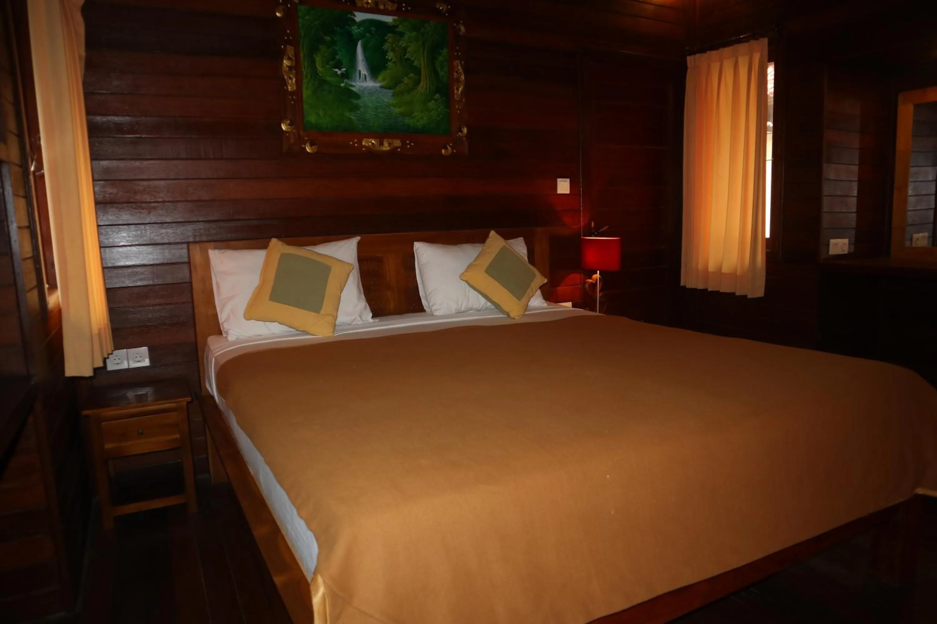 Bed in Svaha Nusa Guest House
