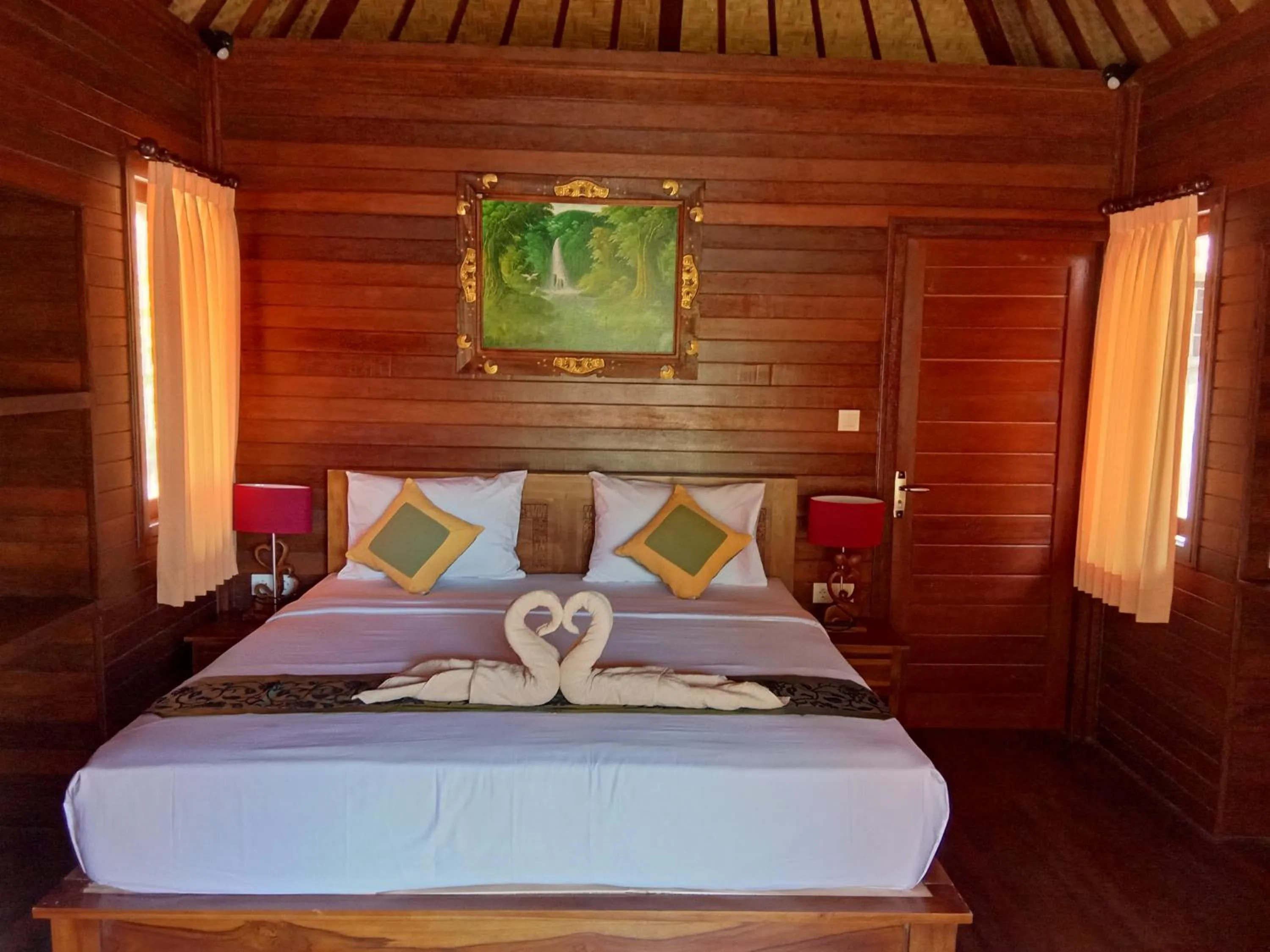 Bed in Svaha Nusa Guest House