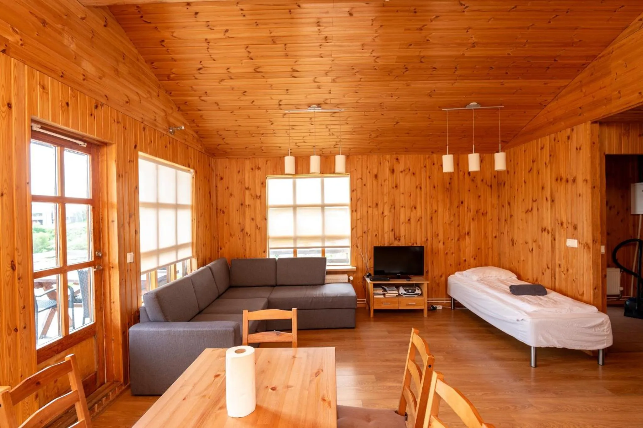 Living room, Bed in Gladheimar Cottages