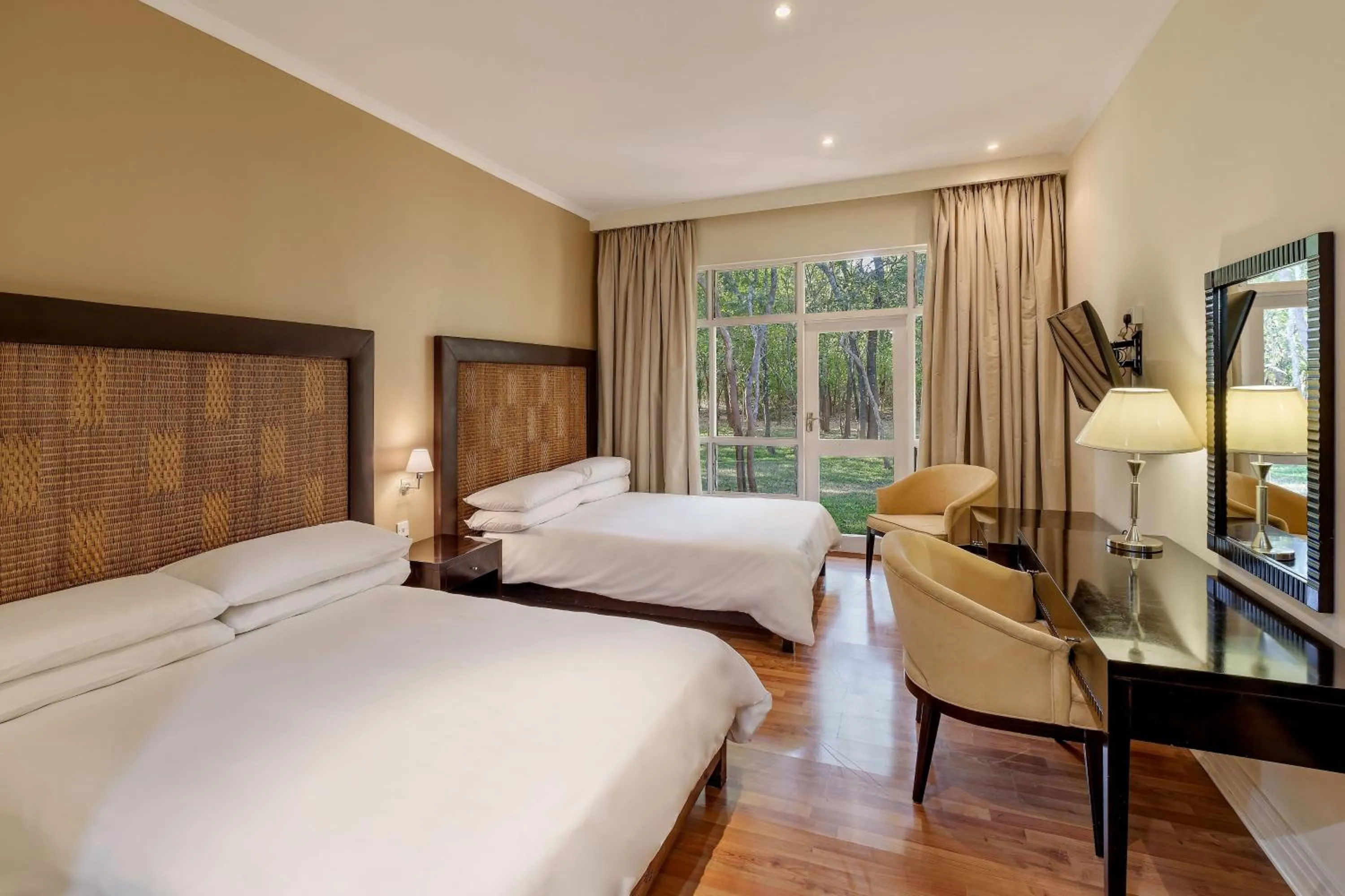 Photo of the whole room, Bed in Protea Hotel by Marriott Lusaka Safari Lodge