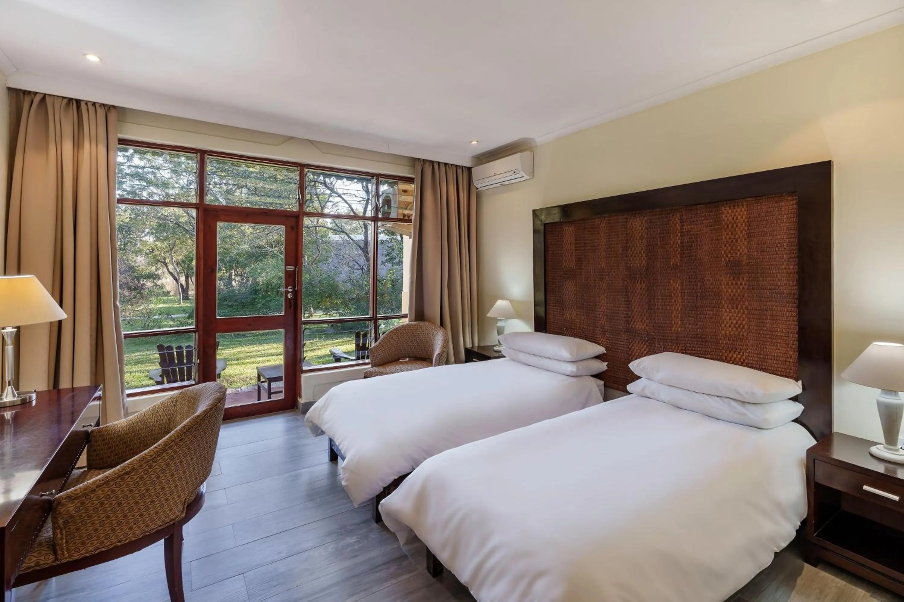 Photo of the whole room, Bed in Protea Hotel by Marriott Lusaka Safari Lodge