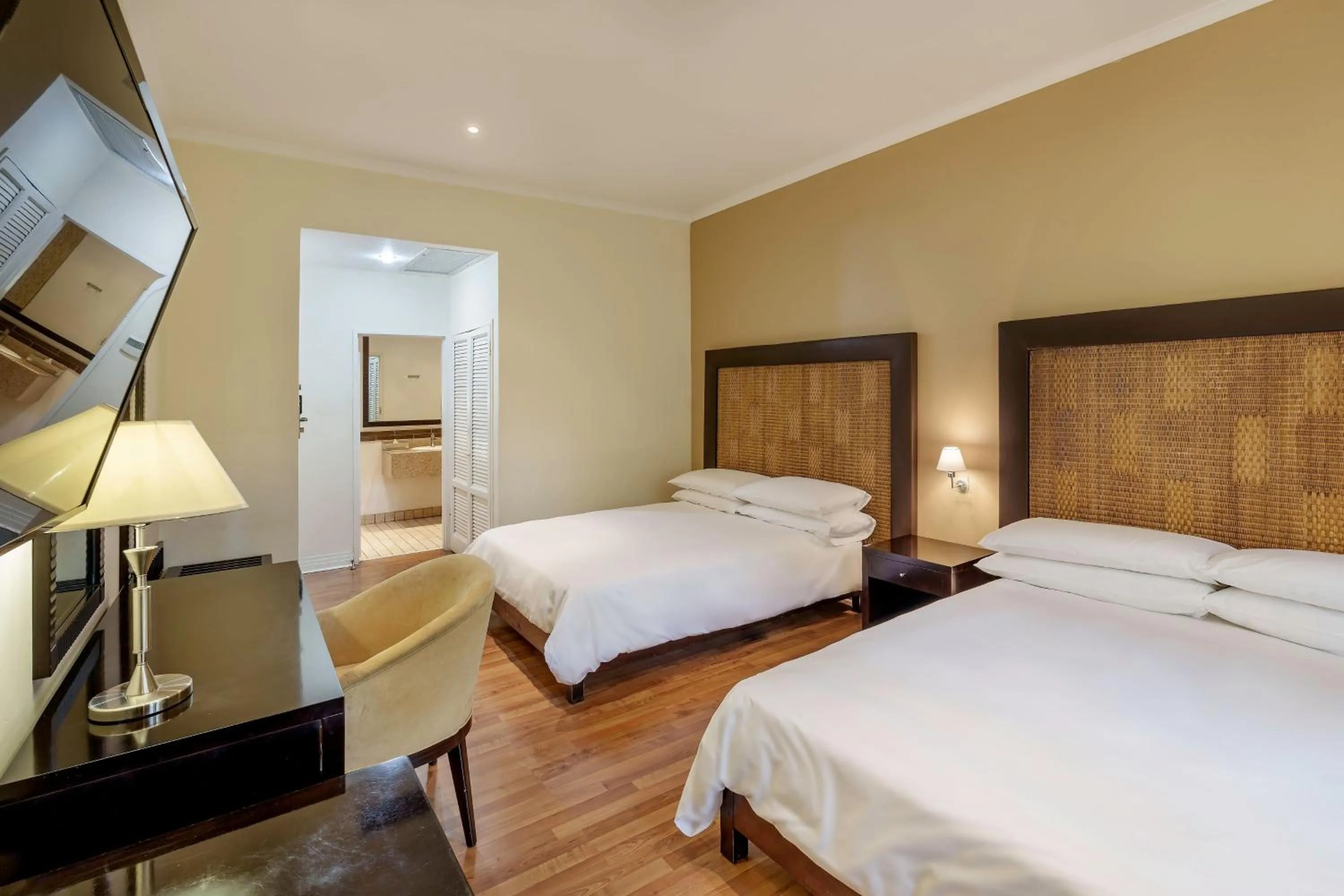 Photo of the whole room, Bed in Protea Hotel by Marriott Lusaka Safari Lodge