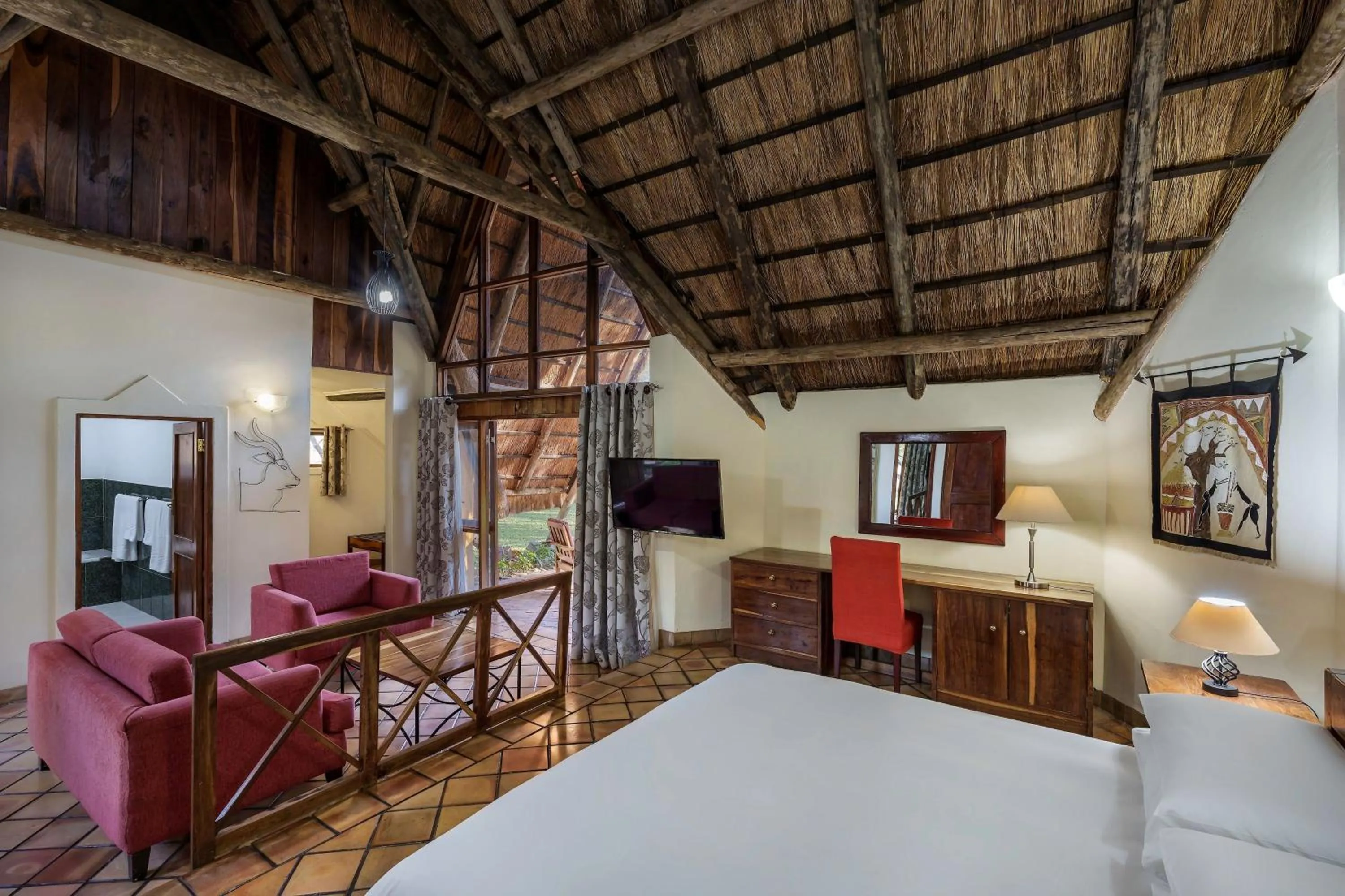 Photo of the whole room, Bed in Protea Hotel by Marriott Lusaka Safari Lodge