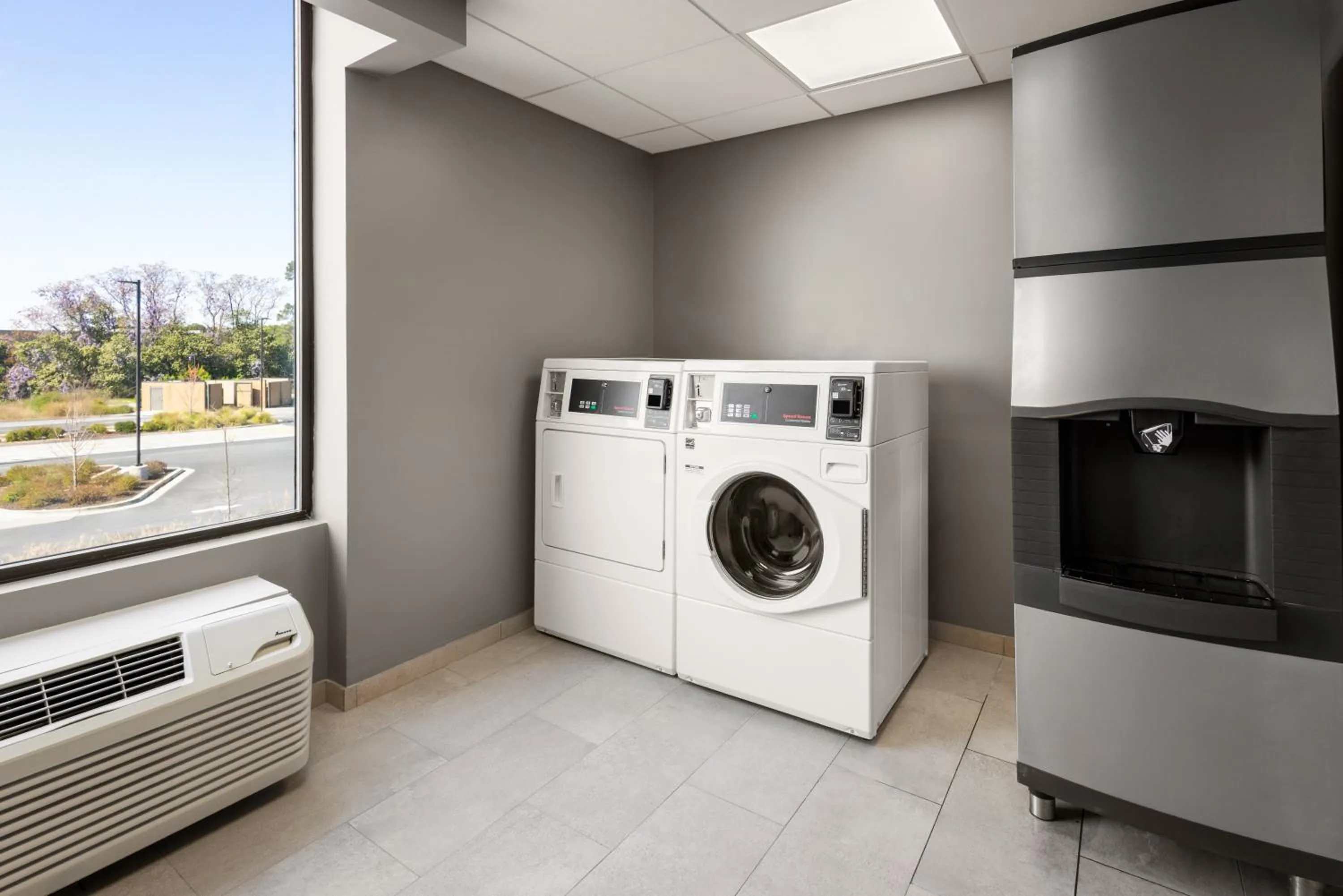 laundry in Holiday Inn & Suites Columbia NE - Ft Jackson Area by IHG