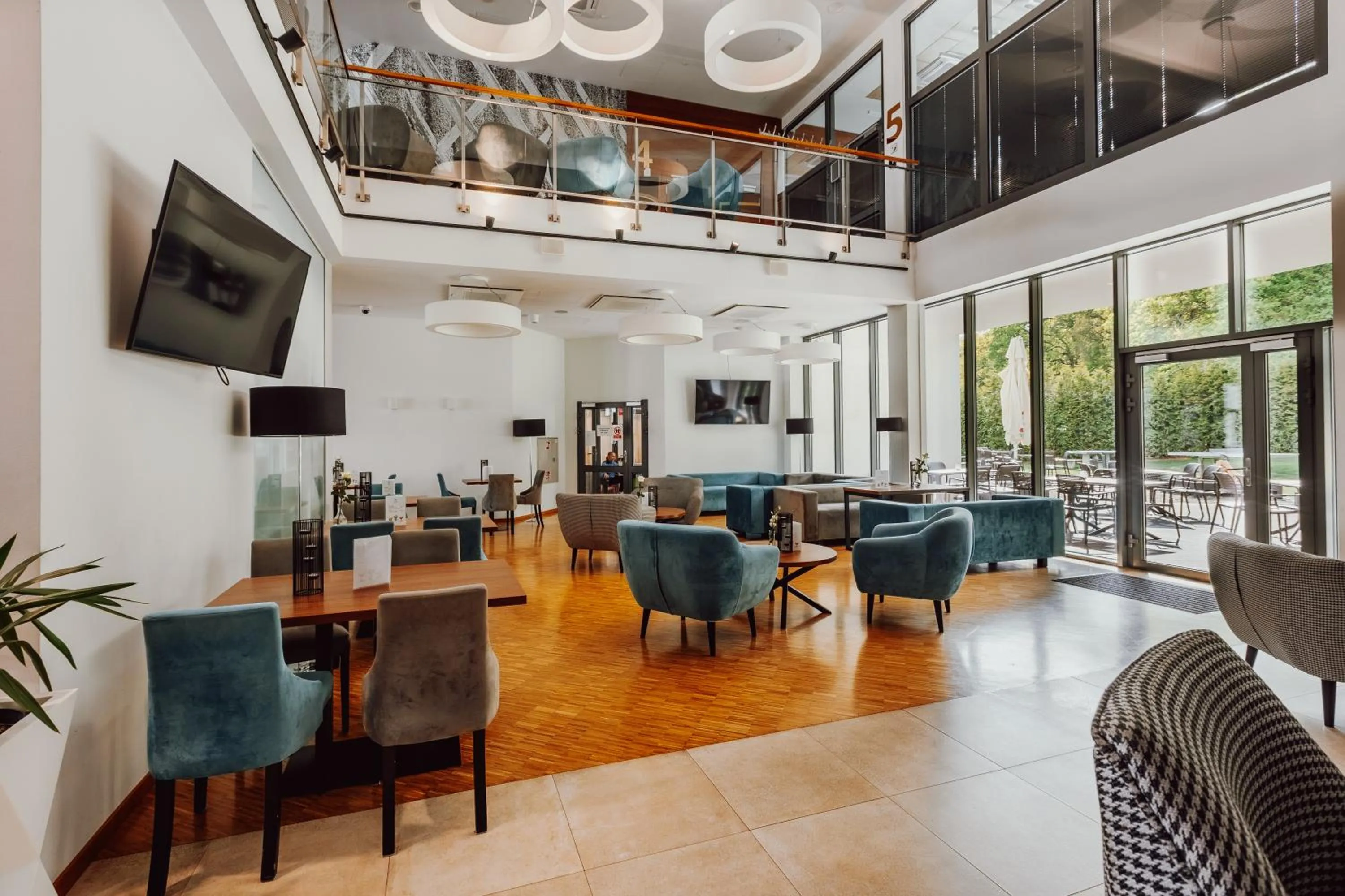 Communal lounge/ TV room in Aparthotel Termy Uniejów