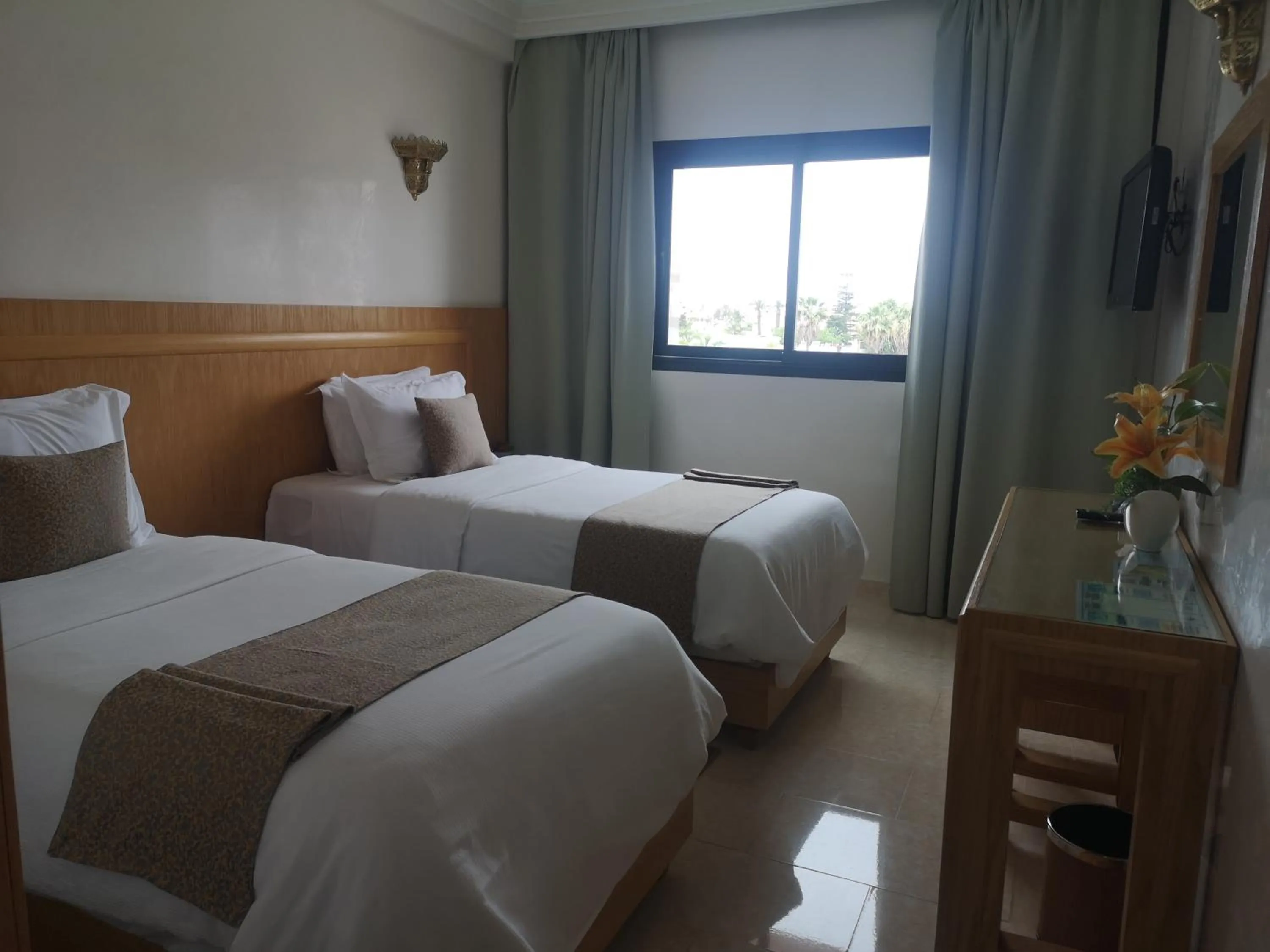 Bed in Majliss Hotel Downtown