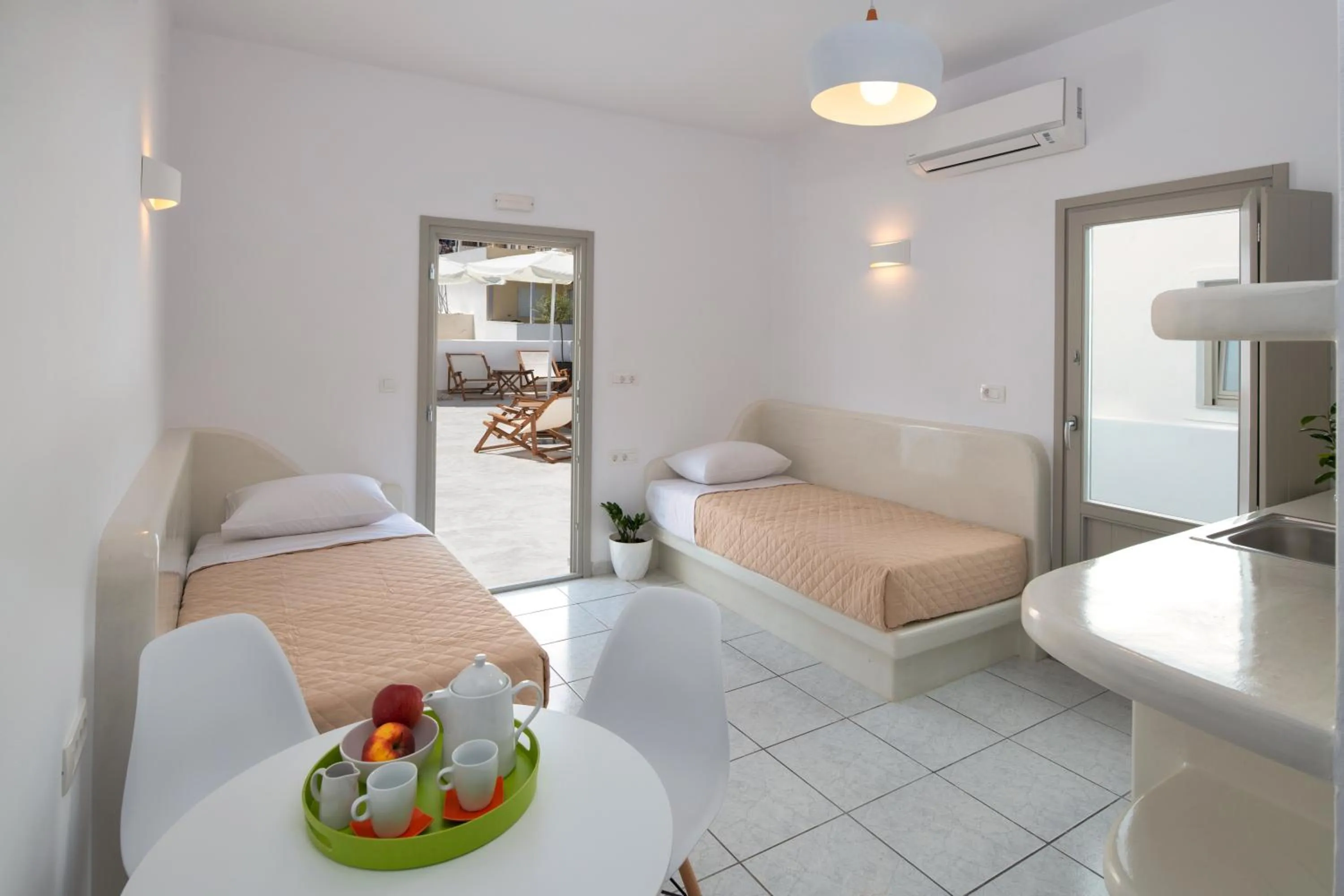 Bed in Olive Tree Suites