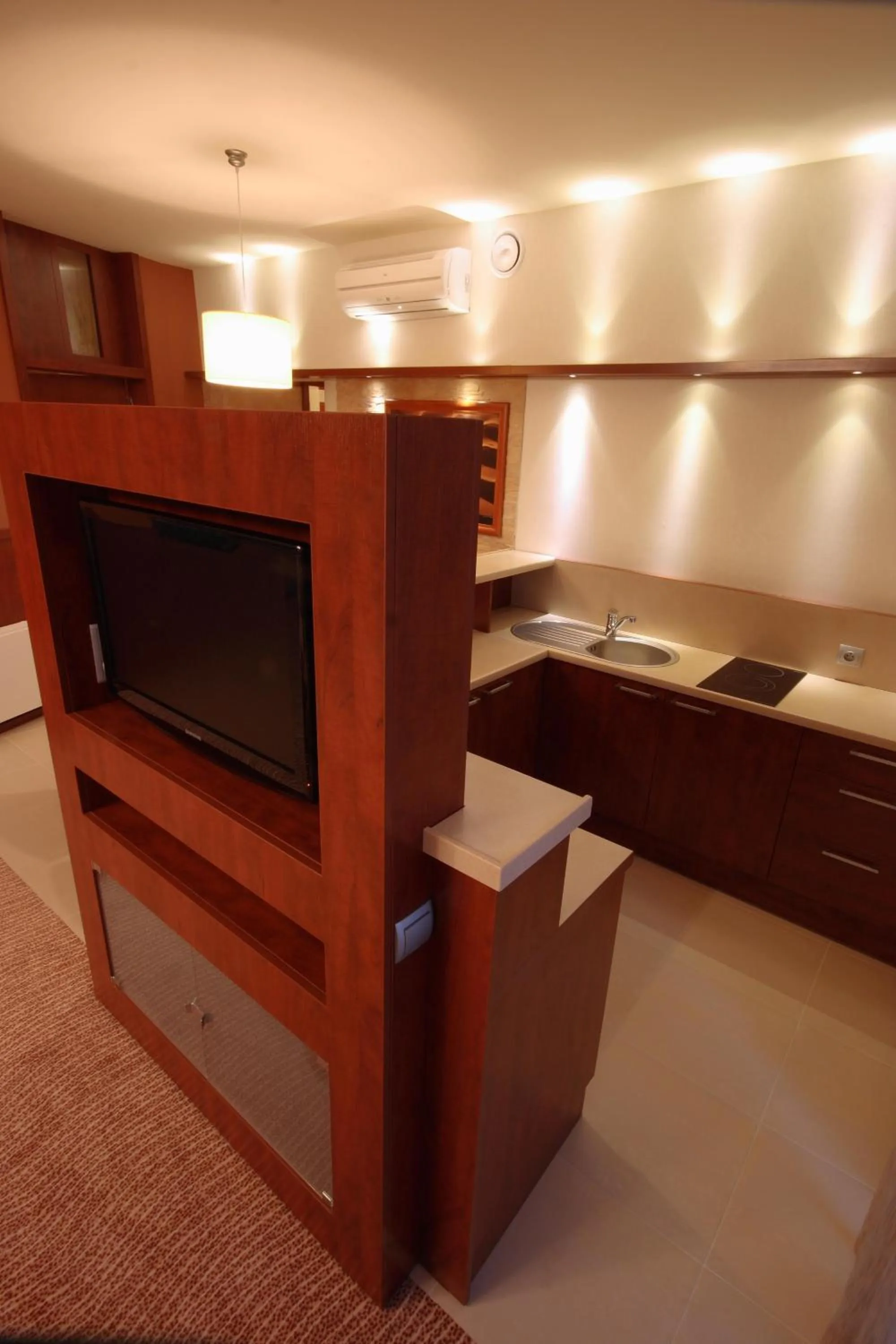 Kitchen or kitchenette, Bed in Hotel Sahara