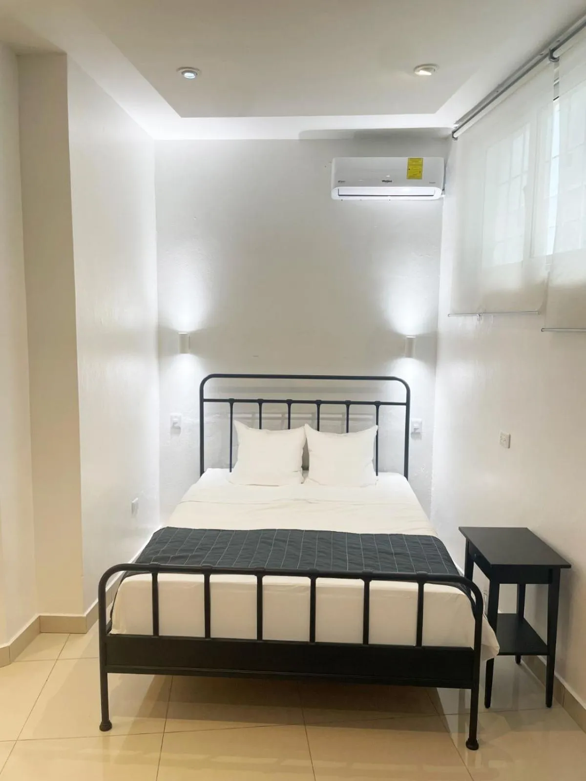 Bed in City Caribbean Hotel Boutique