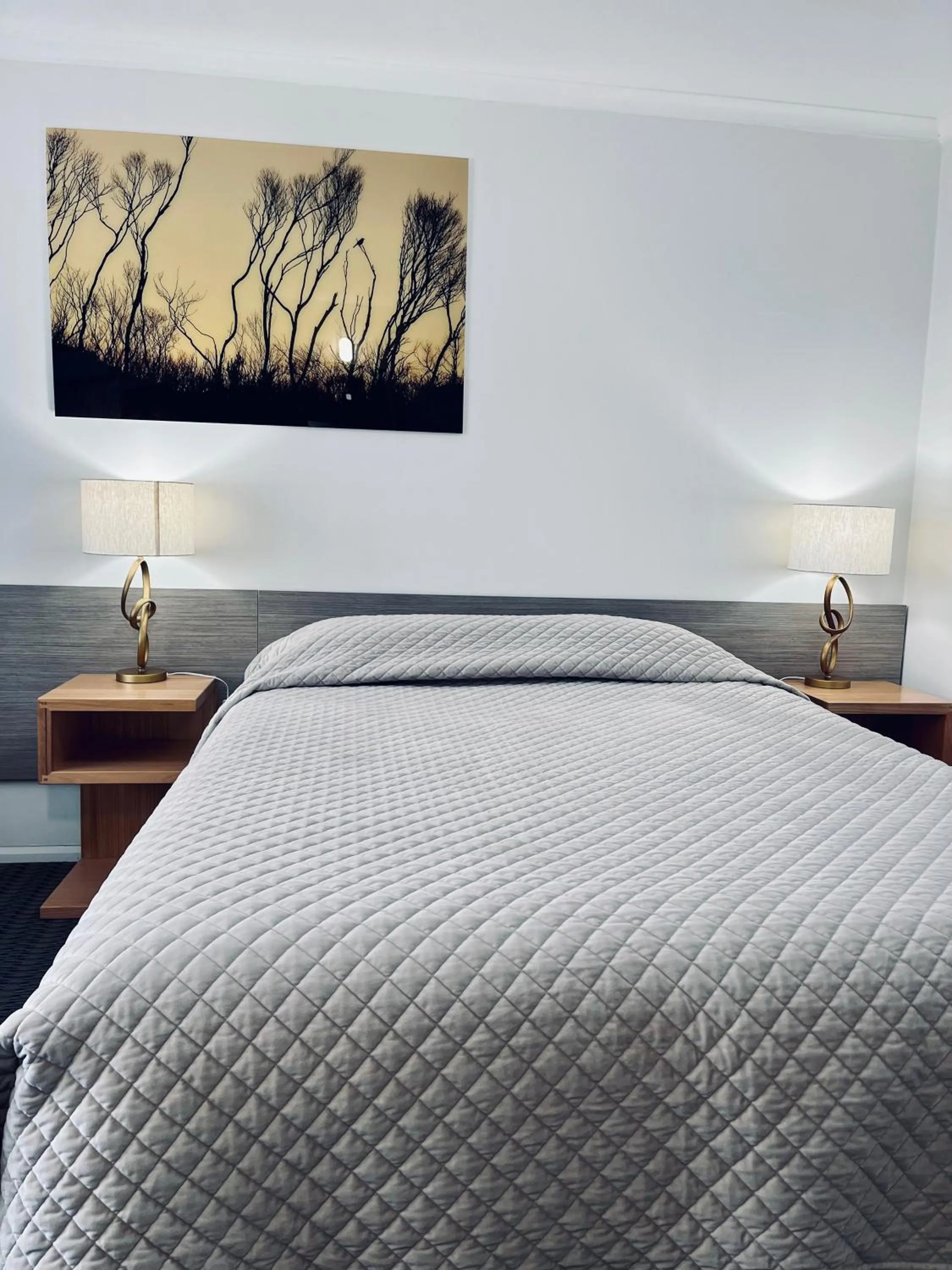 Bed in Heemskirk Motor Hotel