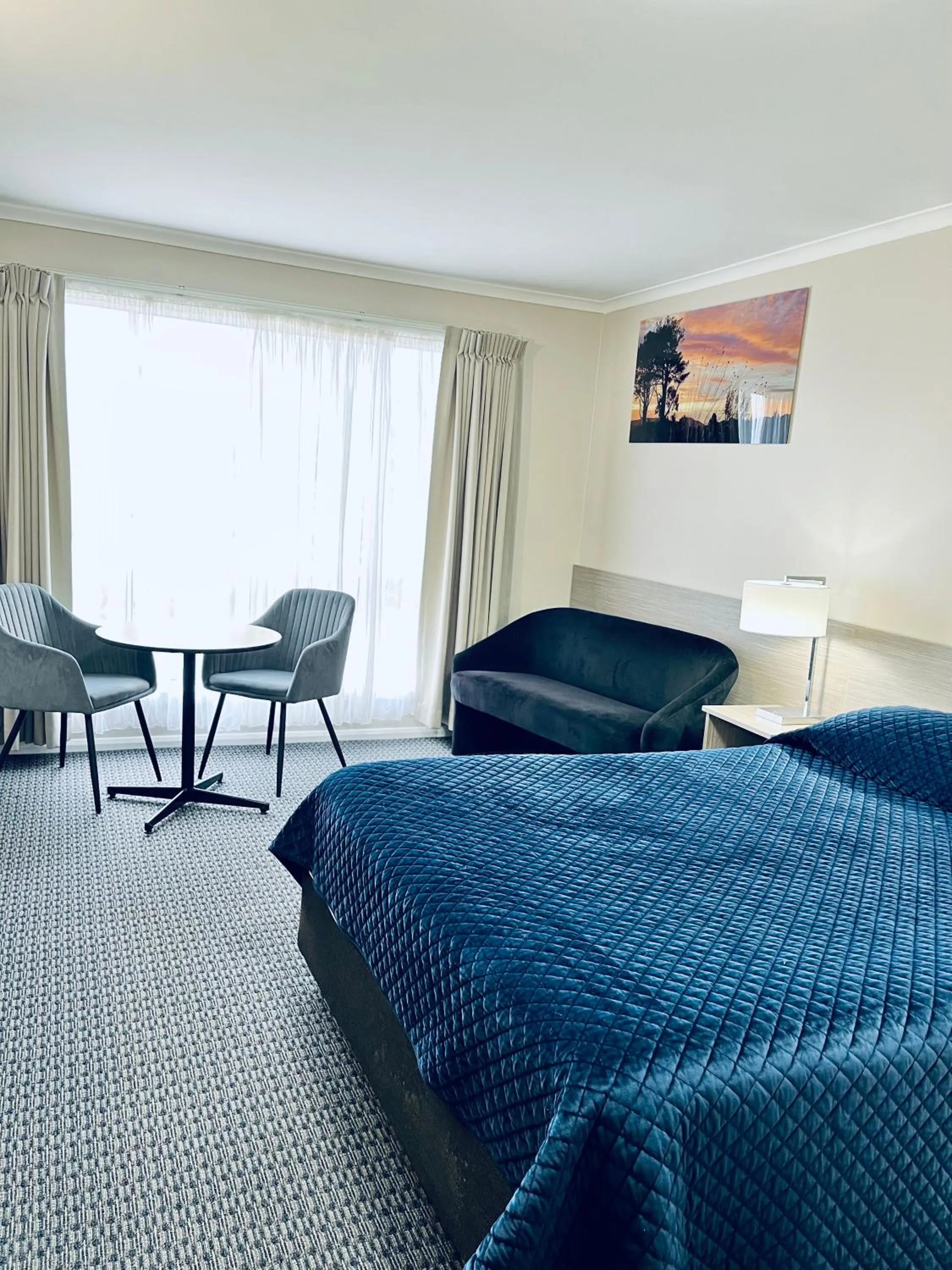 Bed in Heemskirk Motor Hotel