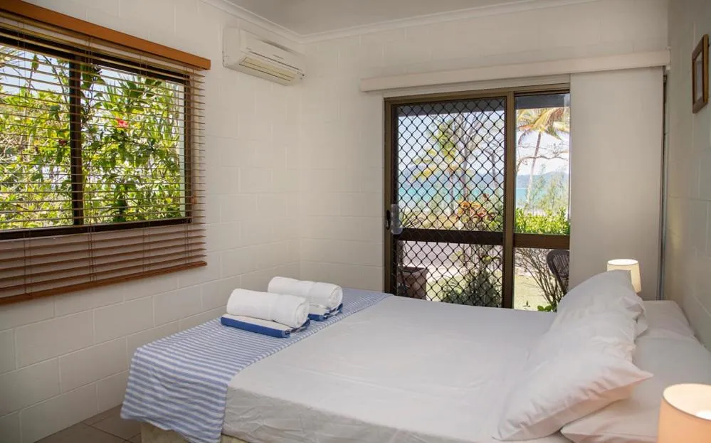 Bed in Apollo Jewel Beachfront Apartments