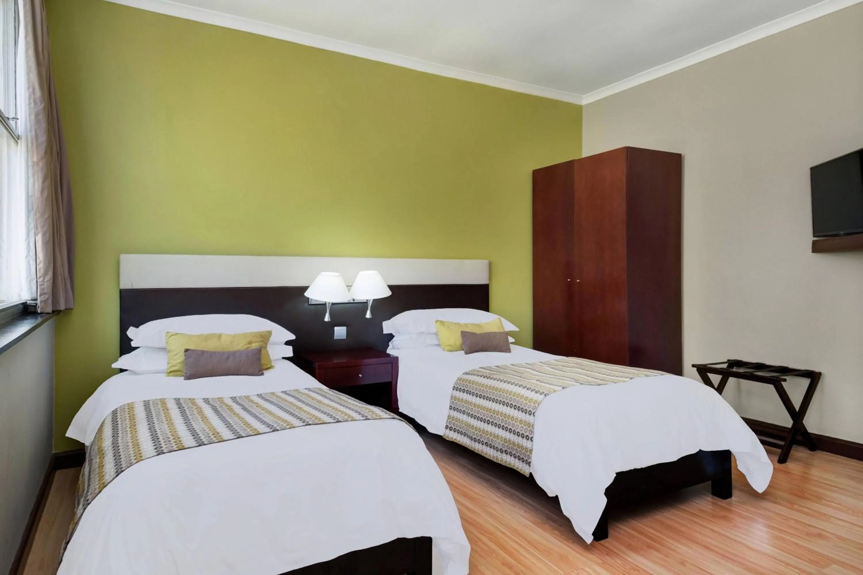 Photo of the whole room, Bed in Protea Hotel by Marriott Lusaka Cairo Road