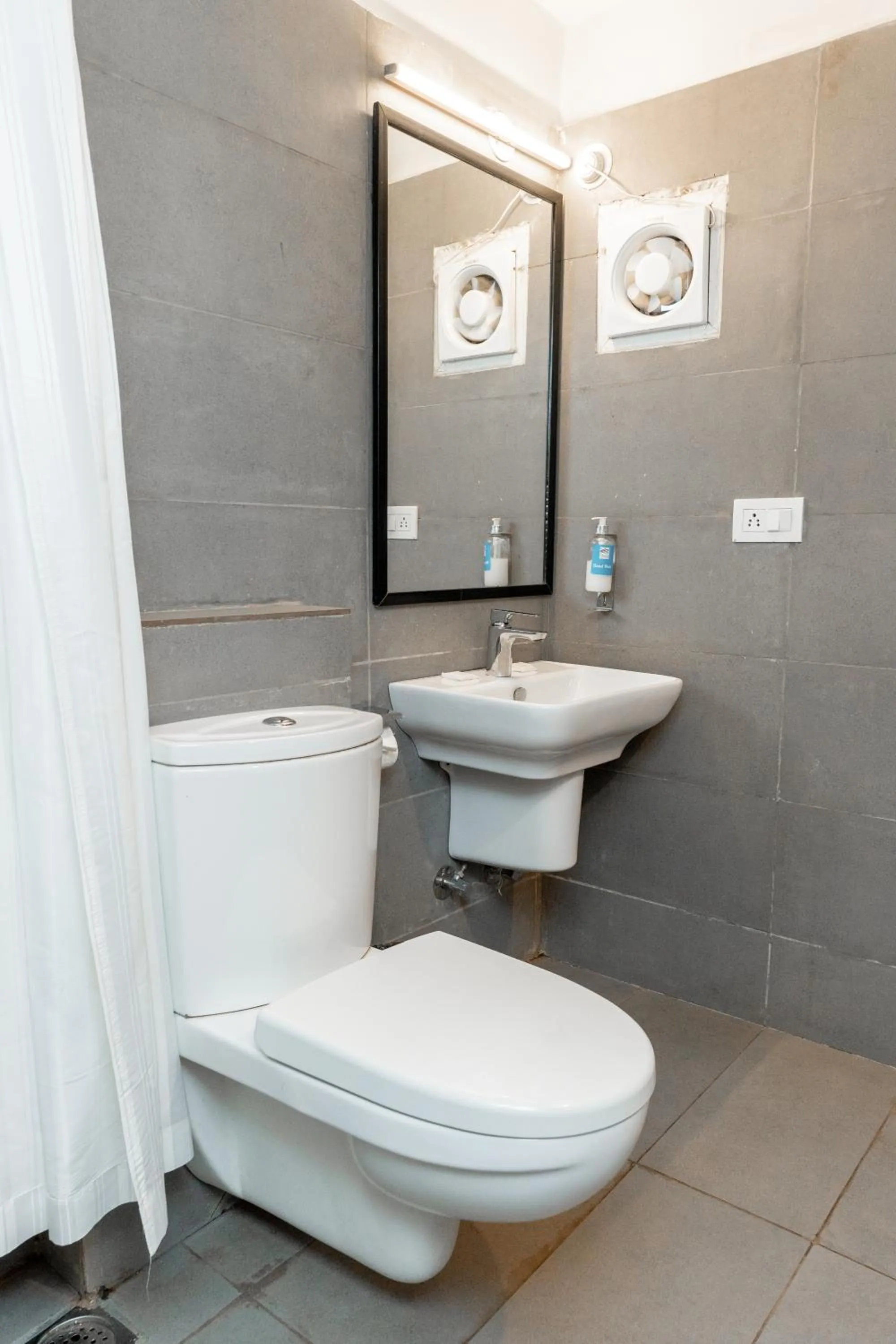 Bathroom in Magnum Resorts- Near Candolim Beach, Goa