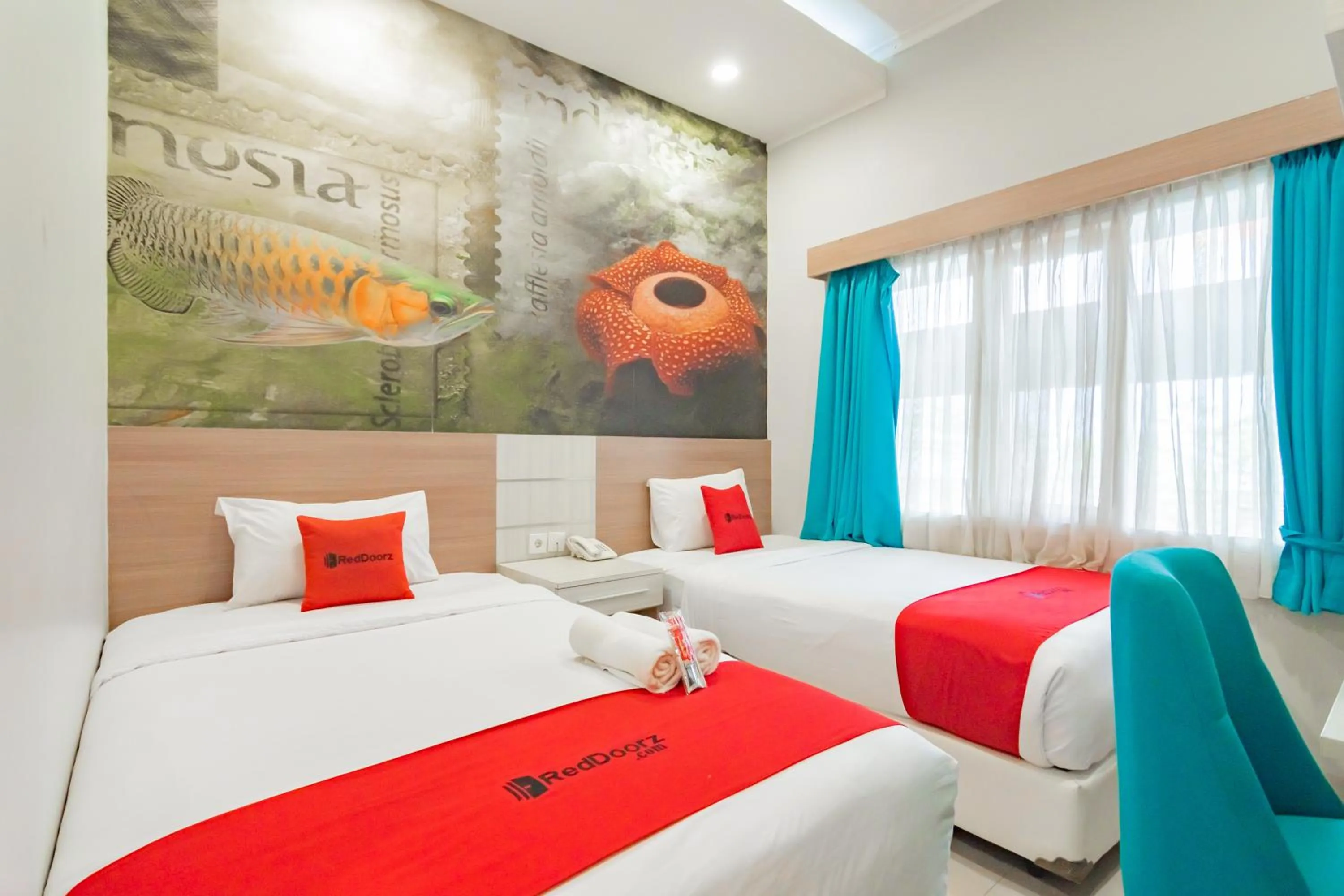 Bed in RedDoorz Plus @ Point Phila Cihampelas