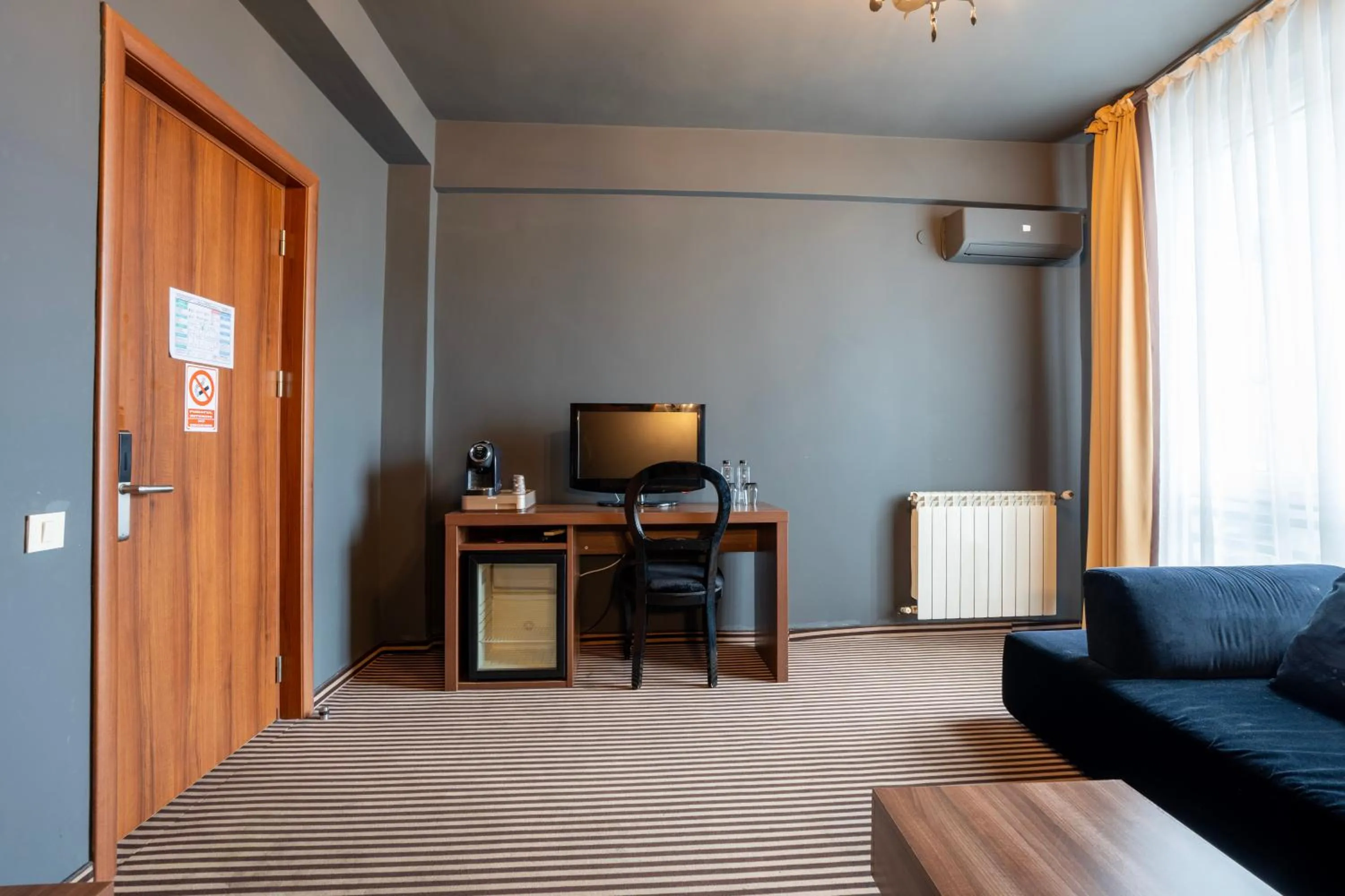 Living room in Alex&George Boutique Hotel