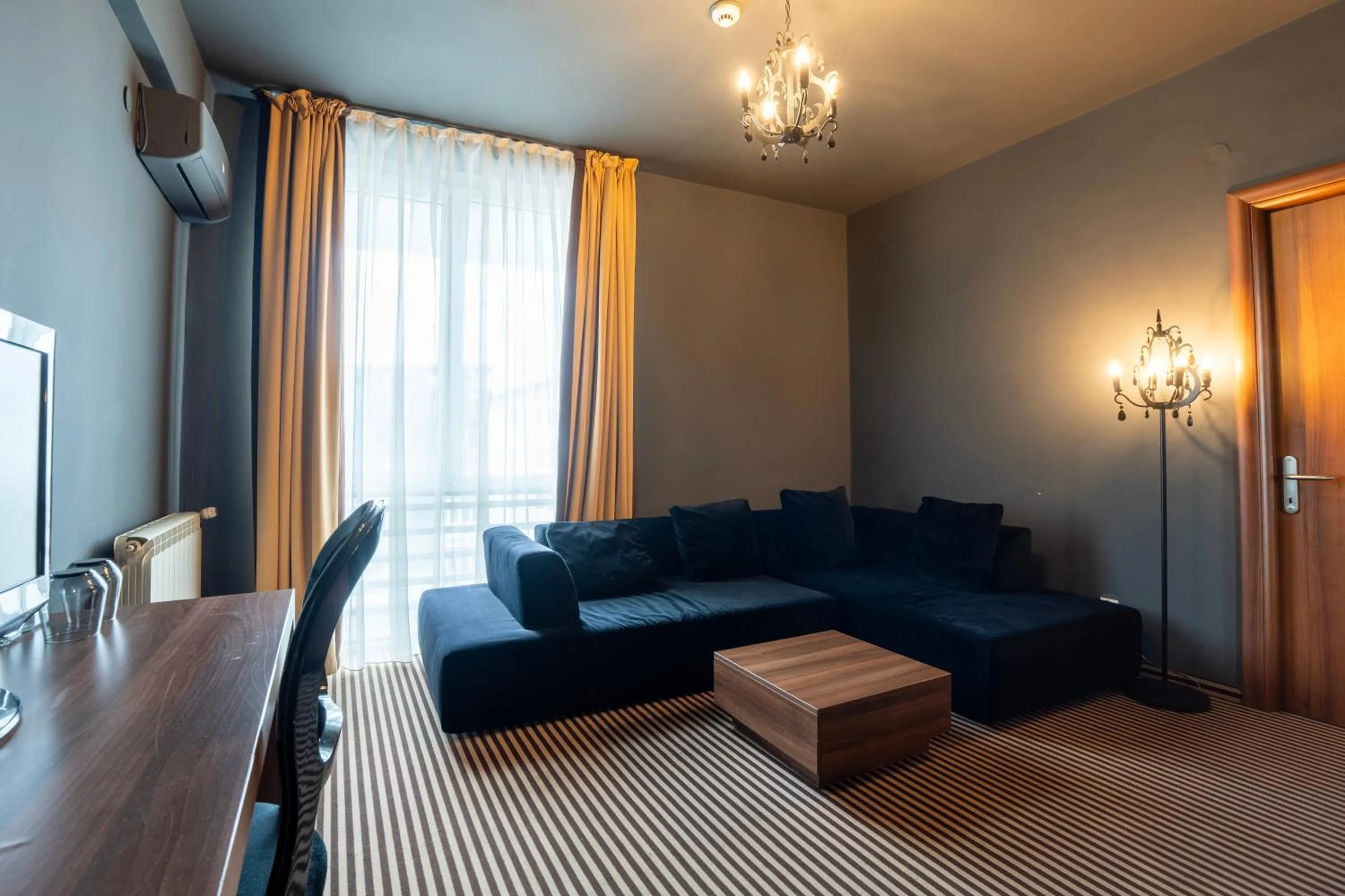 Living room in Alex&George Boutique Hotel