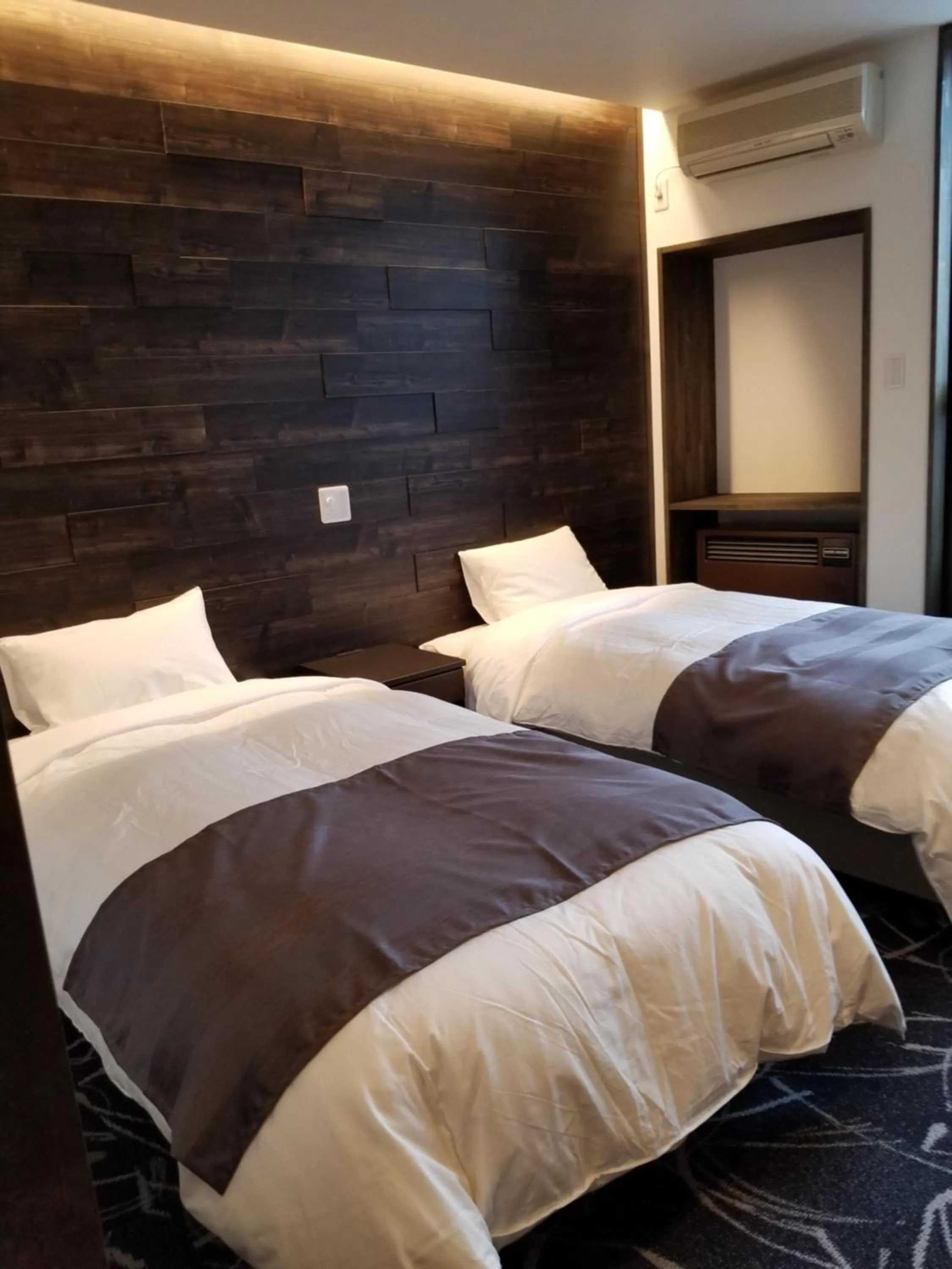 Bed in Hakuba Hotel Hana-no-Sato