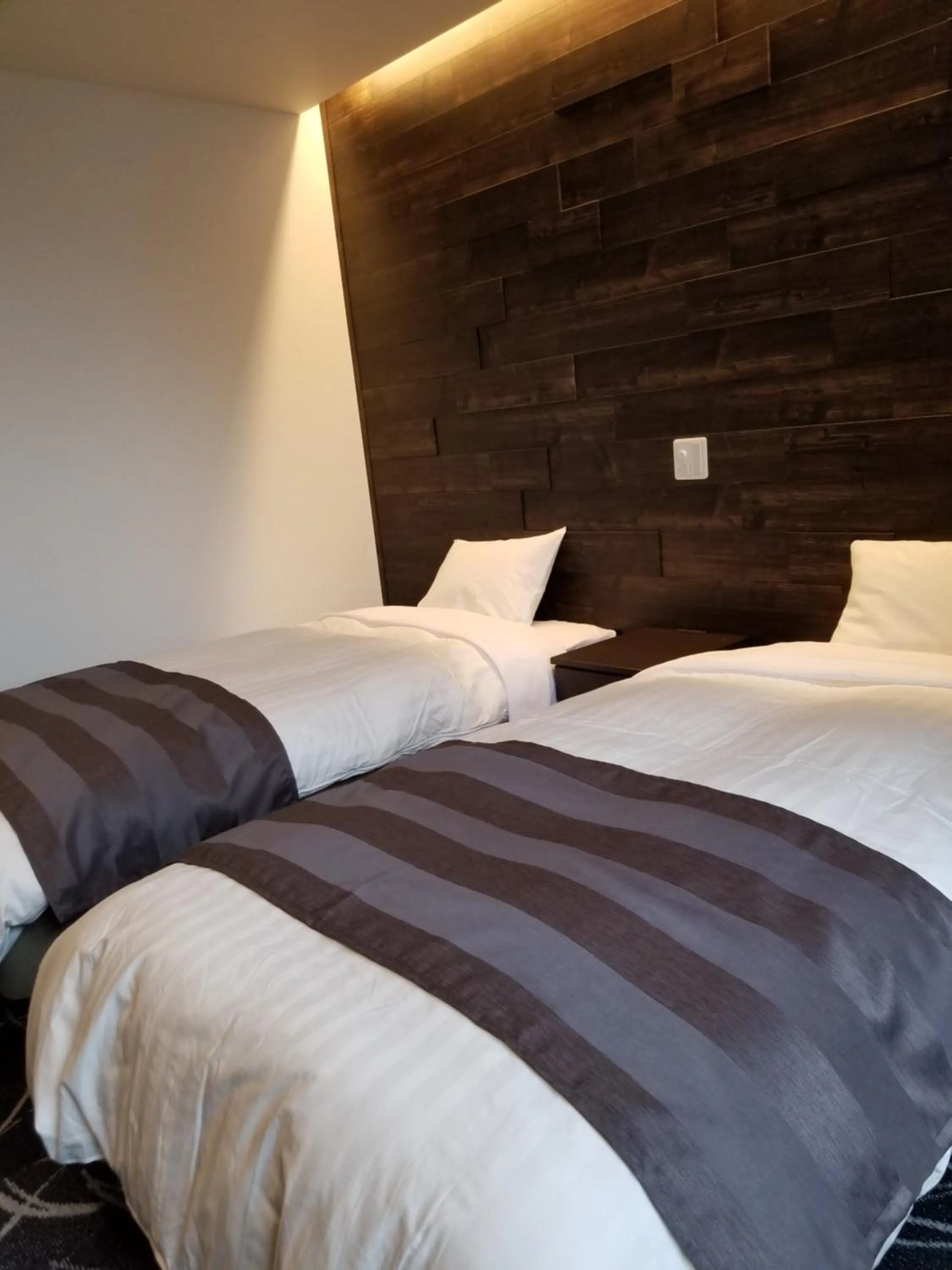 Bed in Hakuba Hotel Hana-no-Sato