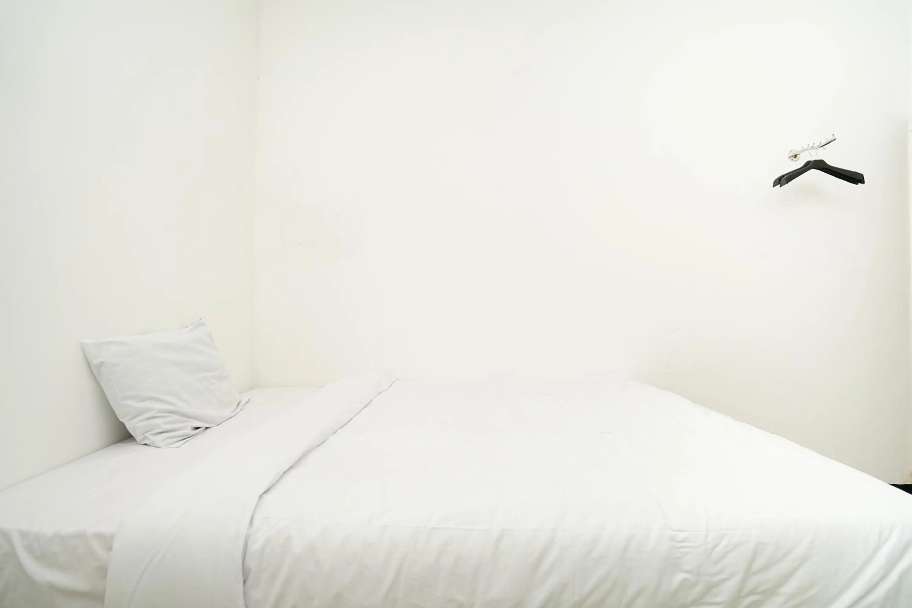 Bedroom, Bed in Merapi Inn Syariah by ecommerceloka