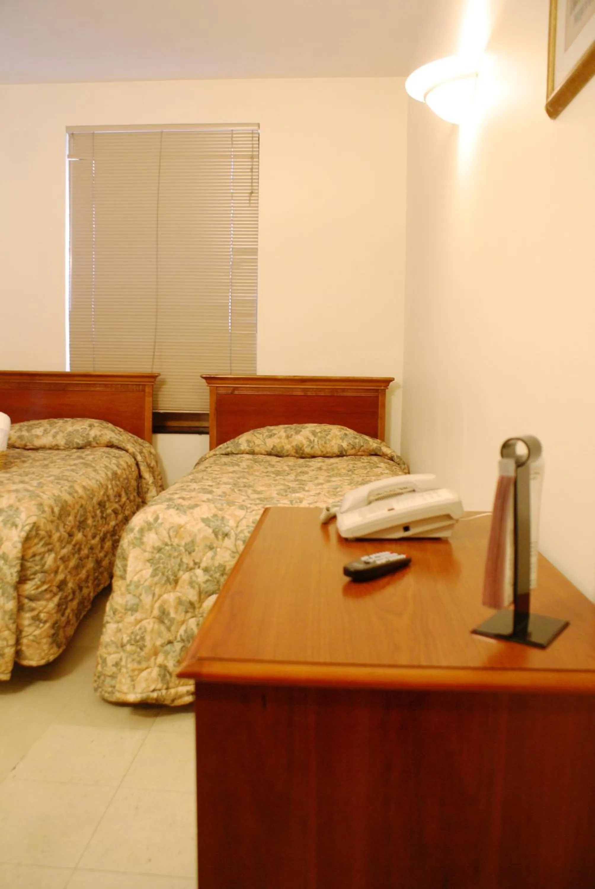 Bed in Americana Inn