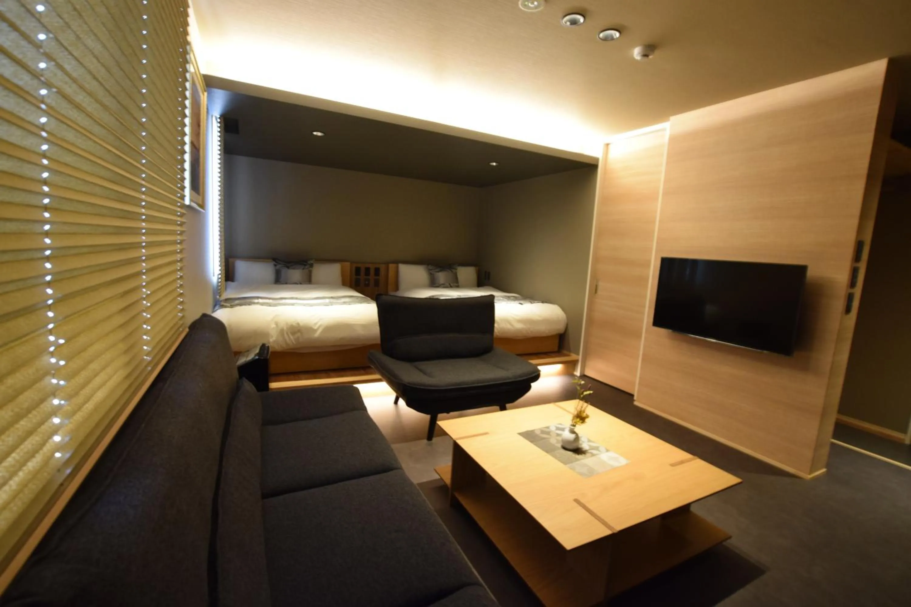 Photo of the whole room in GRAND BASE Beppu Ekimae