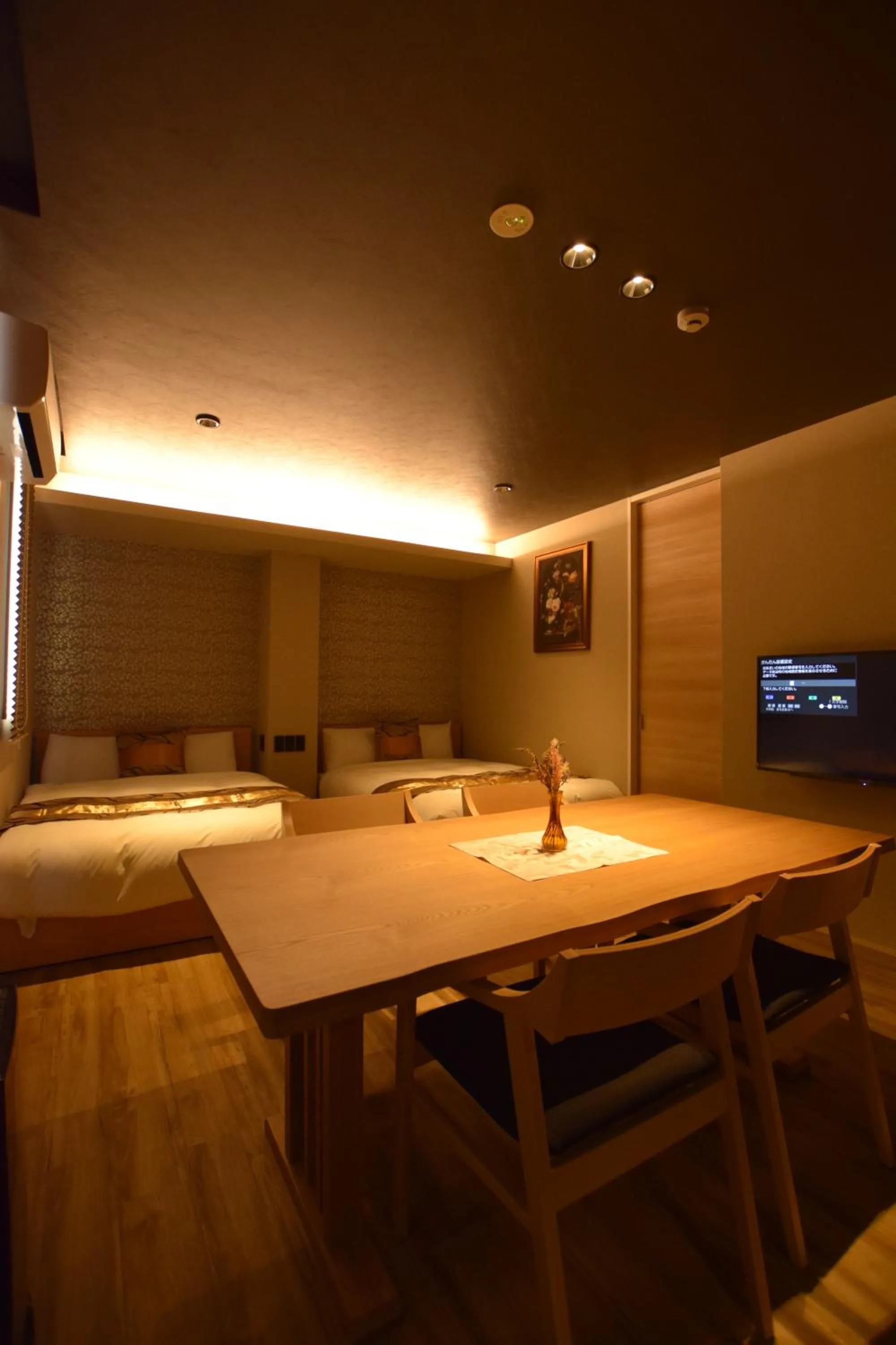 Photo of the whole room in GRAND BASE Beppu Ekimae