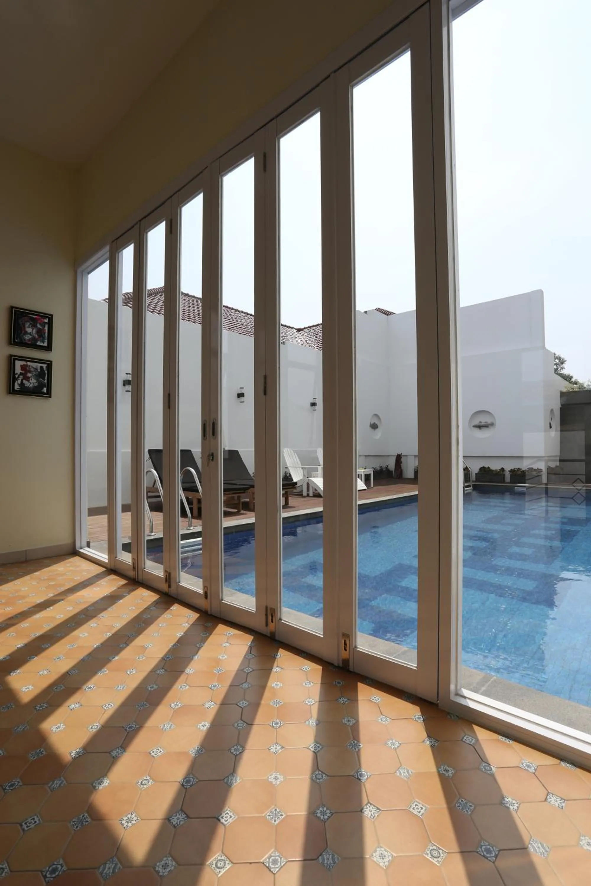 Swimming pool in Urbanest Inn House Slipi