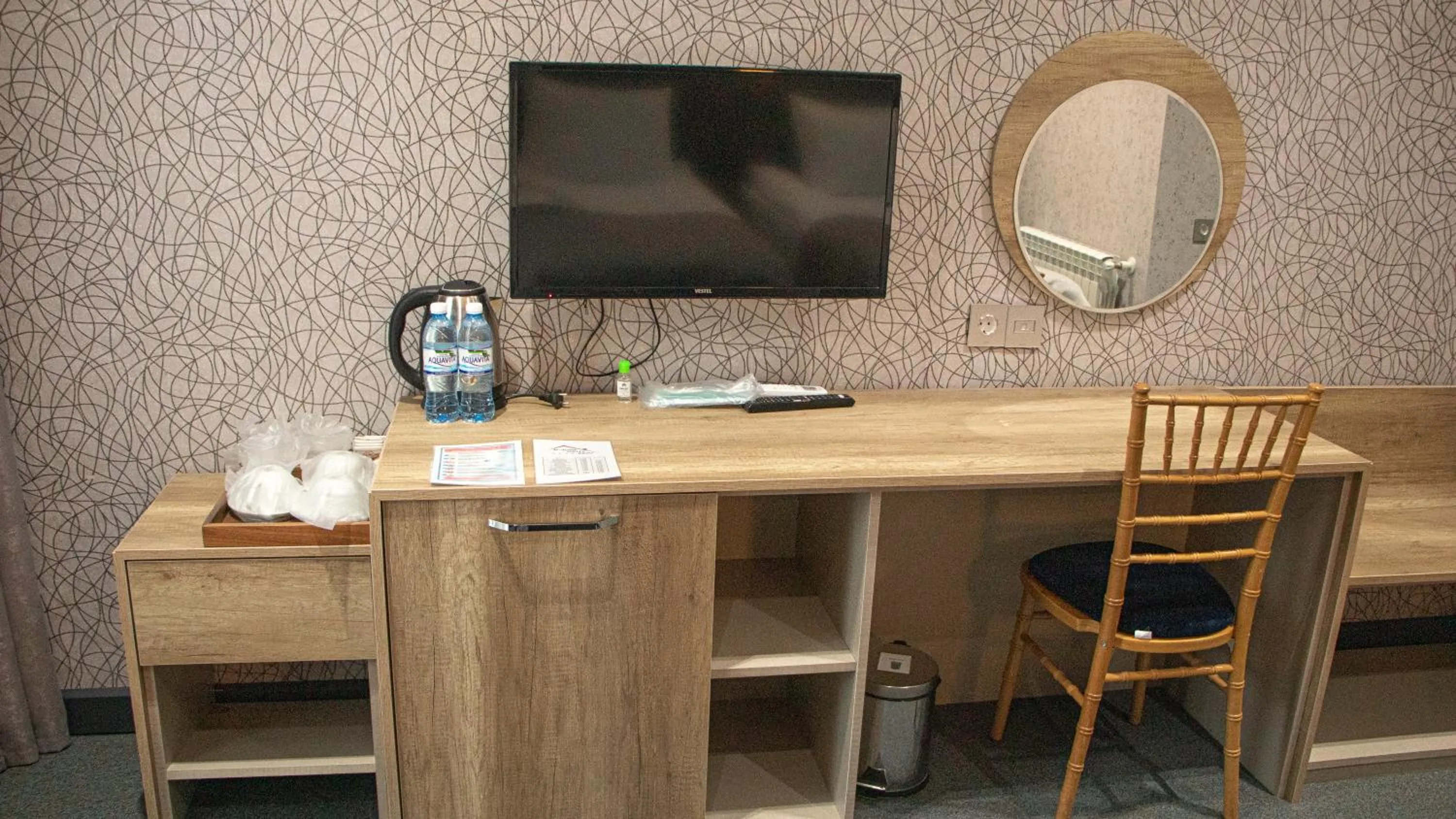 TV and multimedia in Home Suites Baku-Halal Hotel