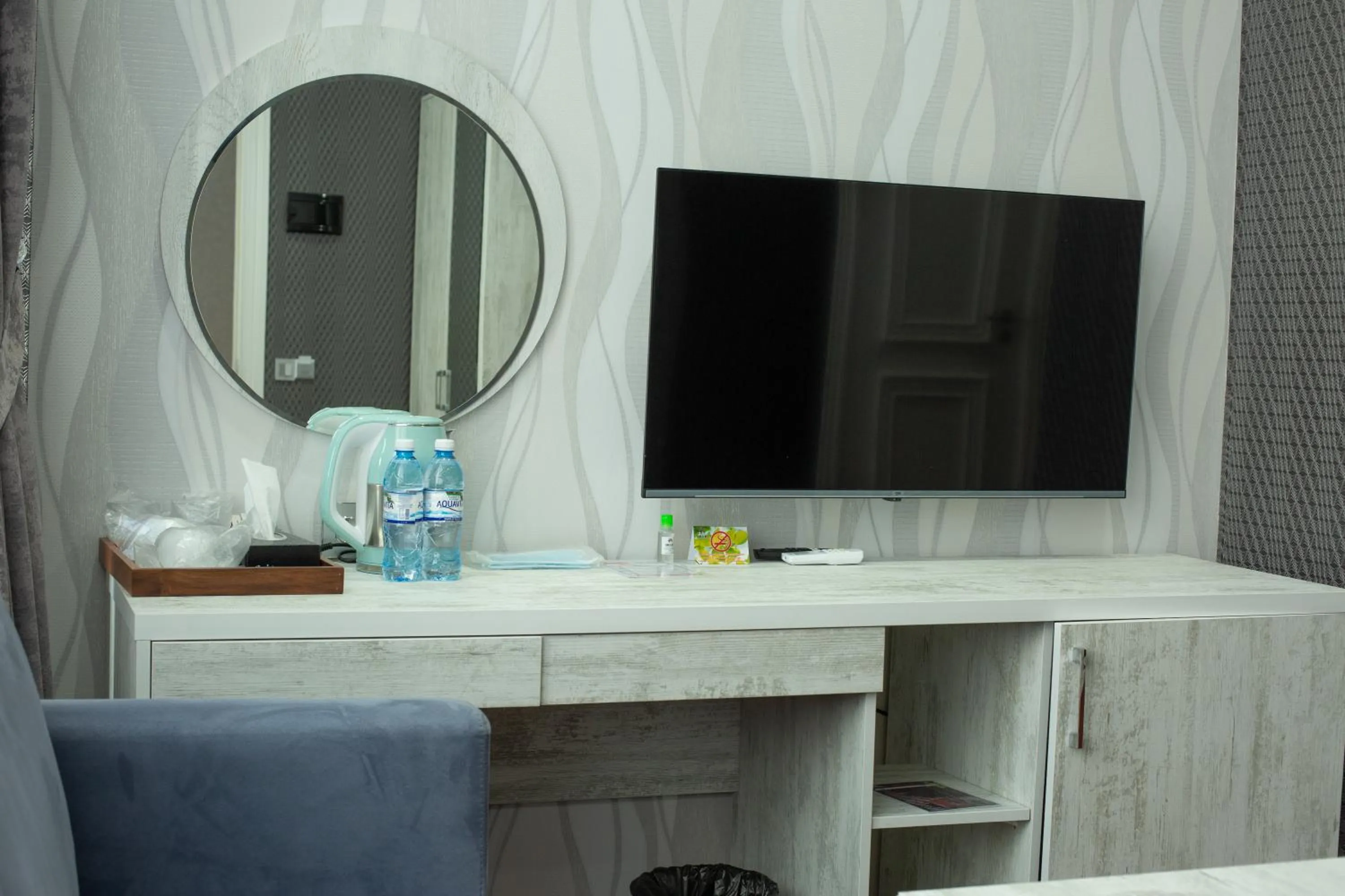 TV and multimedia in Home Suites Baku-Halal Hotel