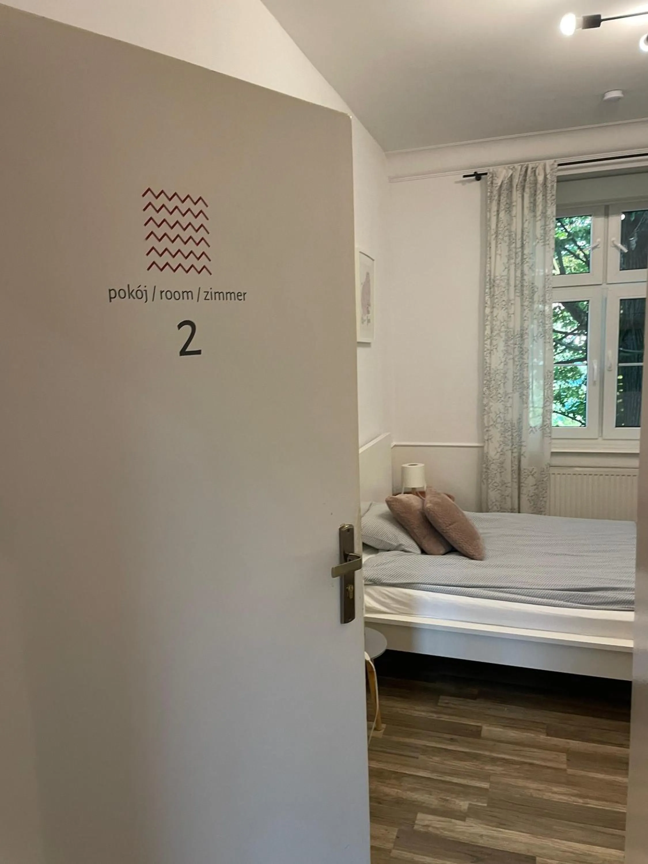 Bed in Bankowa 8 Guest Rooms