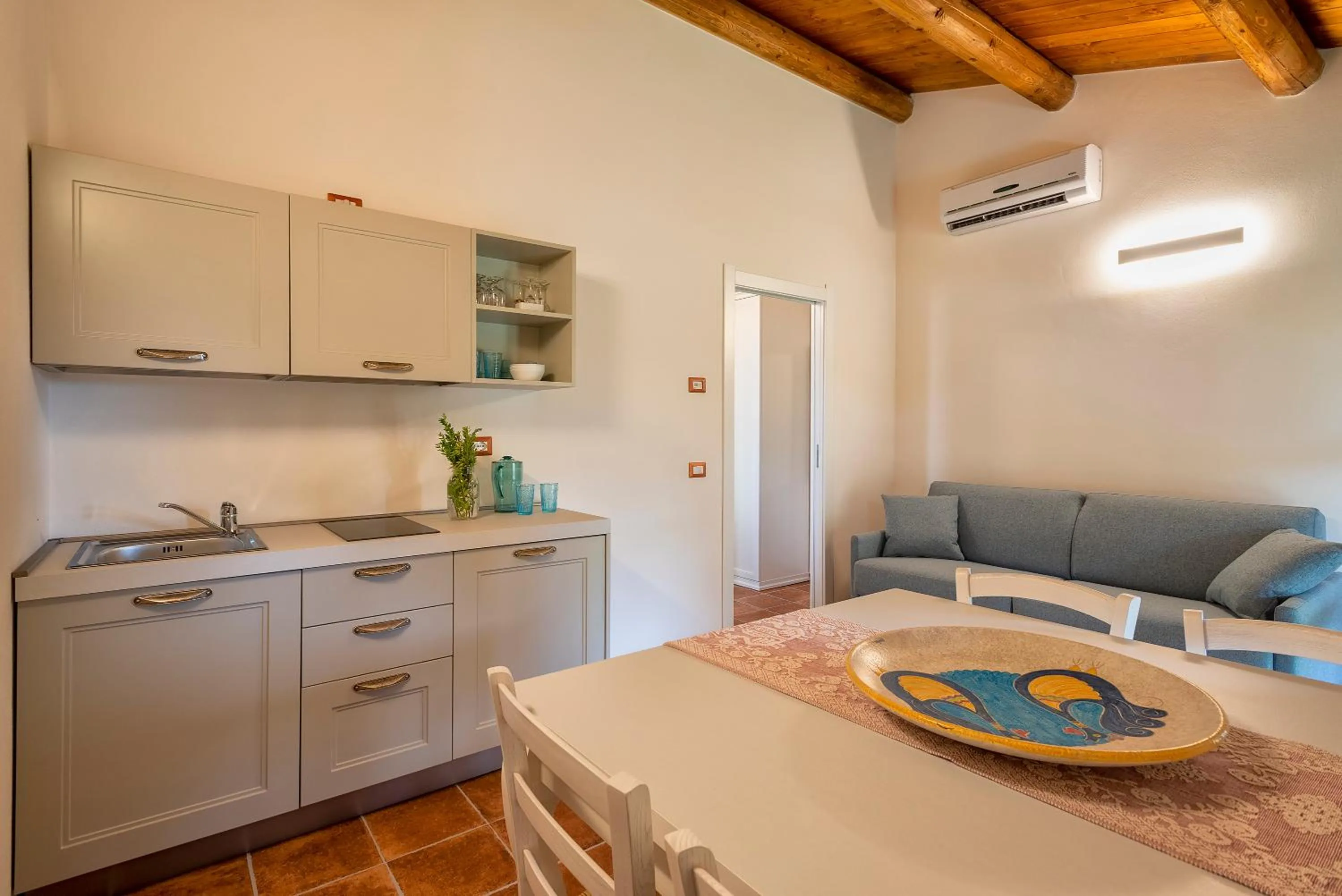 Kitchen or kitchenette in Alghero Resort Country Hotel & Spa