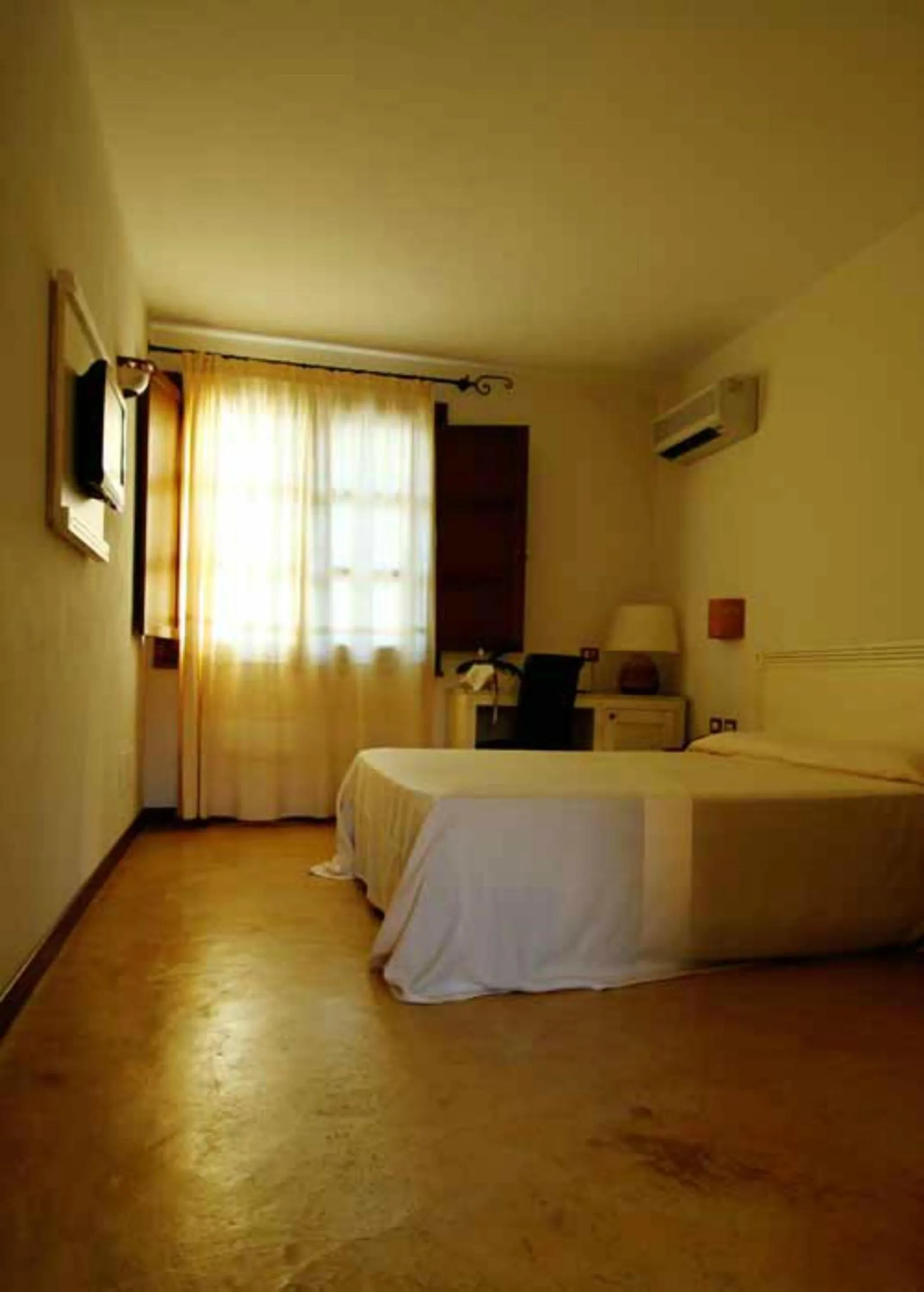 Photo of the whole room, Bed in Alghero Resort Country Hotel & Spa