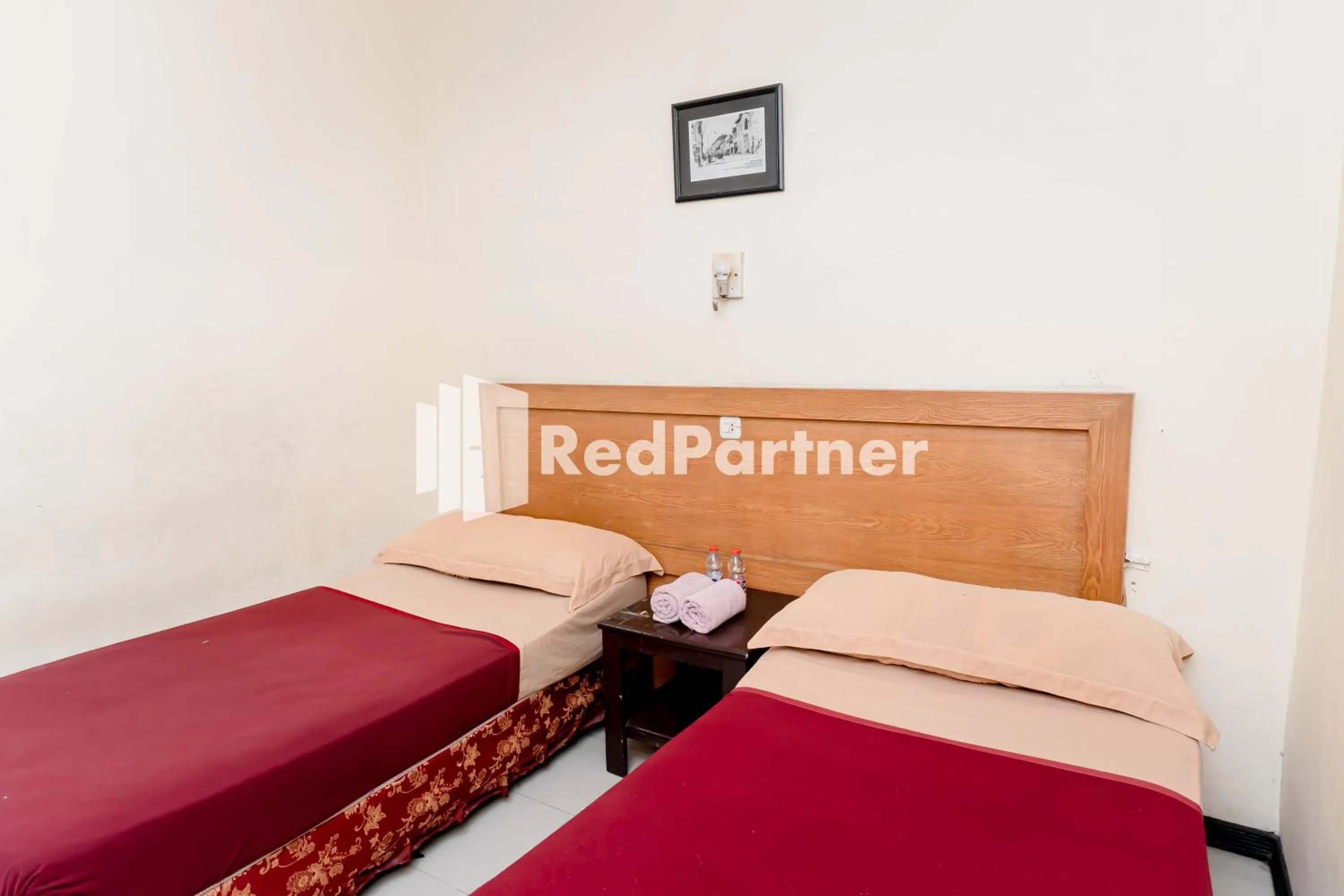 Bedroom, Bed in Cherry Pink Hotel Medan Mitra RedDoorz