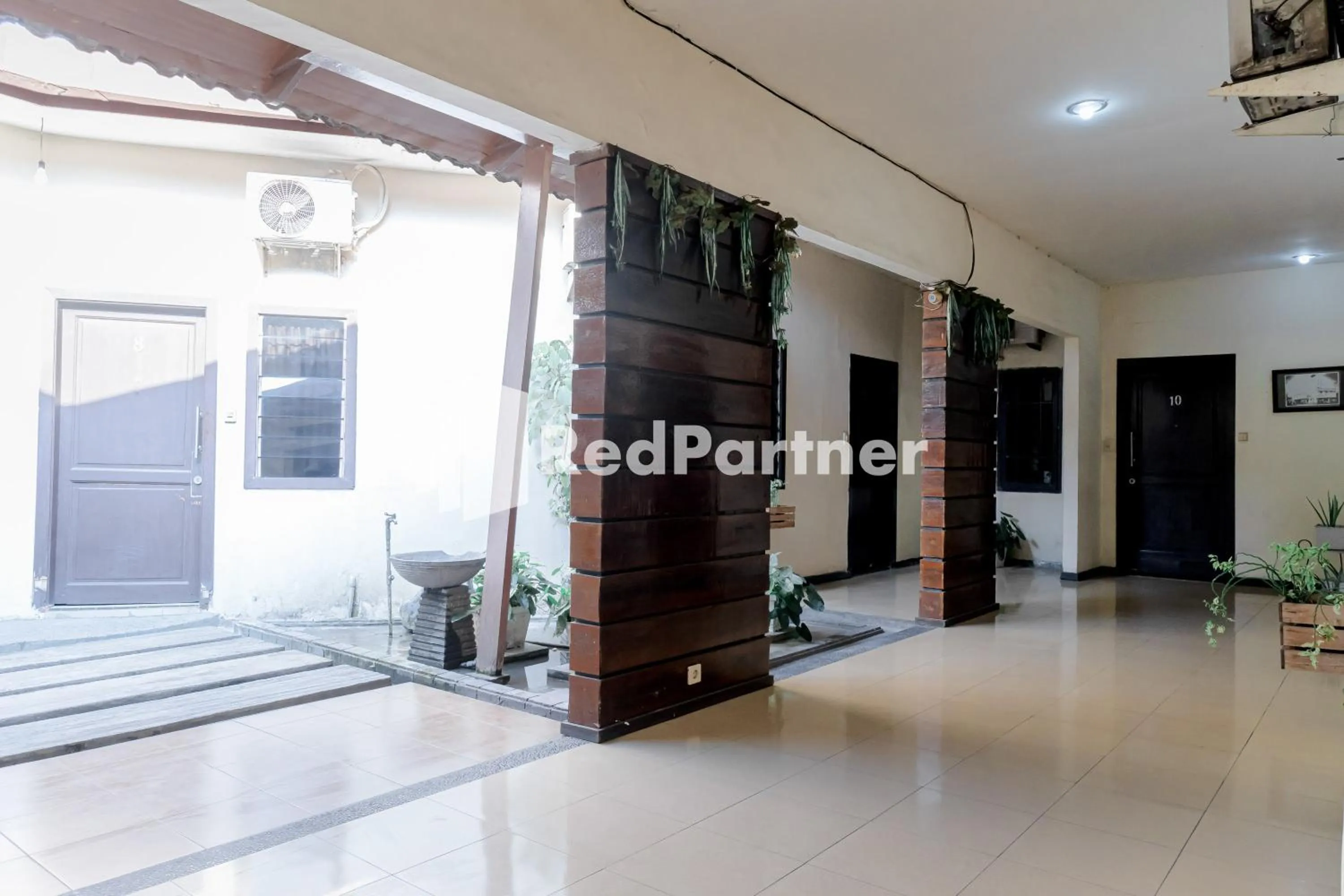 Facade/entrance in Cherry Pink Hotel Medan Mitra RedDoorz