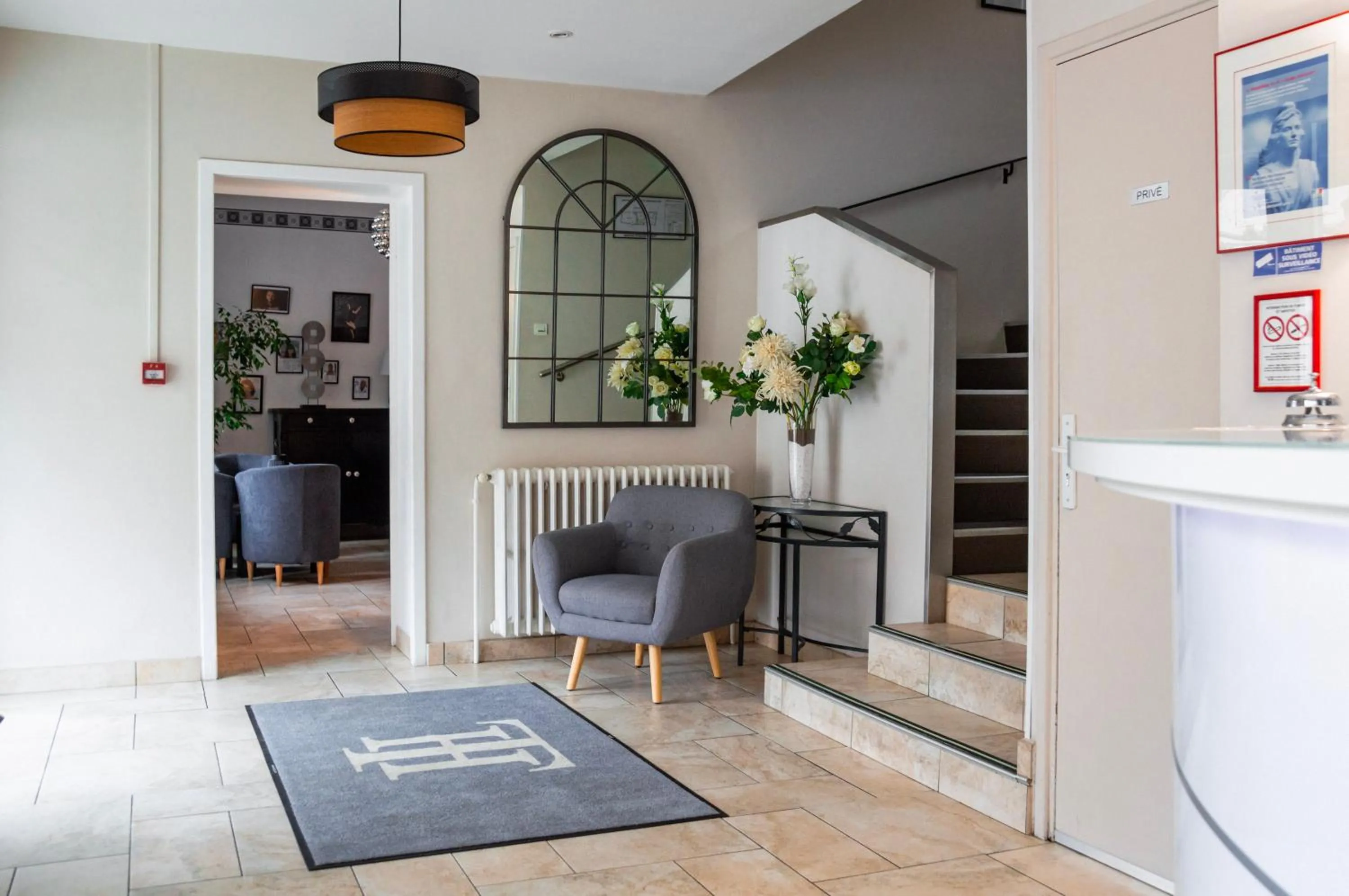 Lobby or reception in Hôtel Le Tivoli