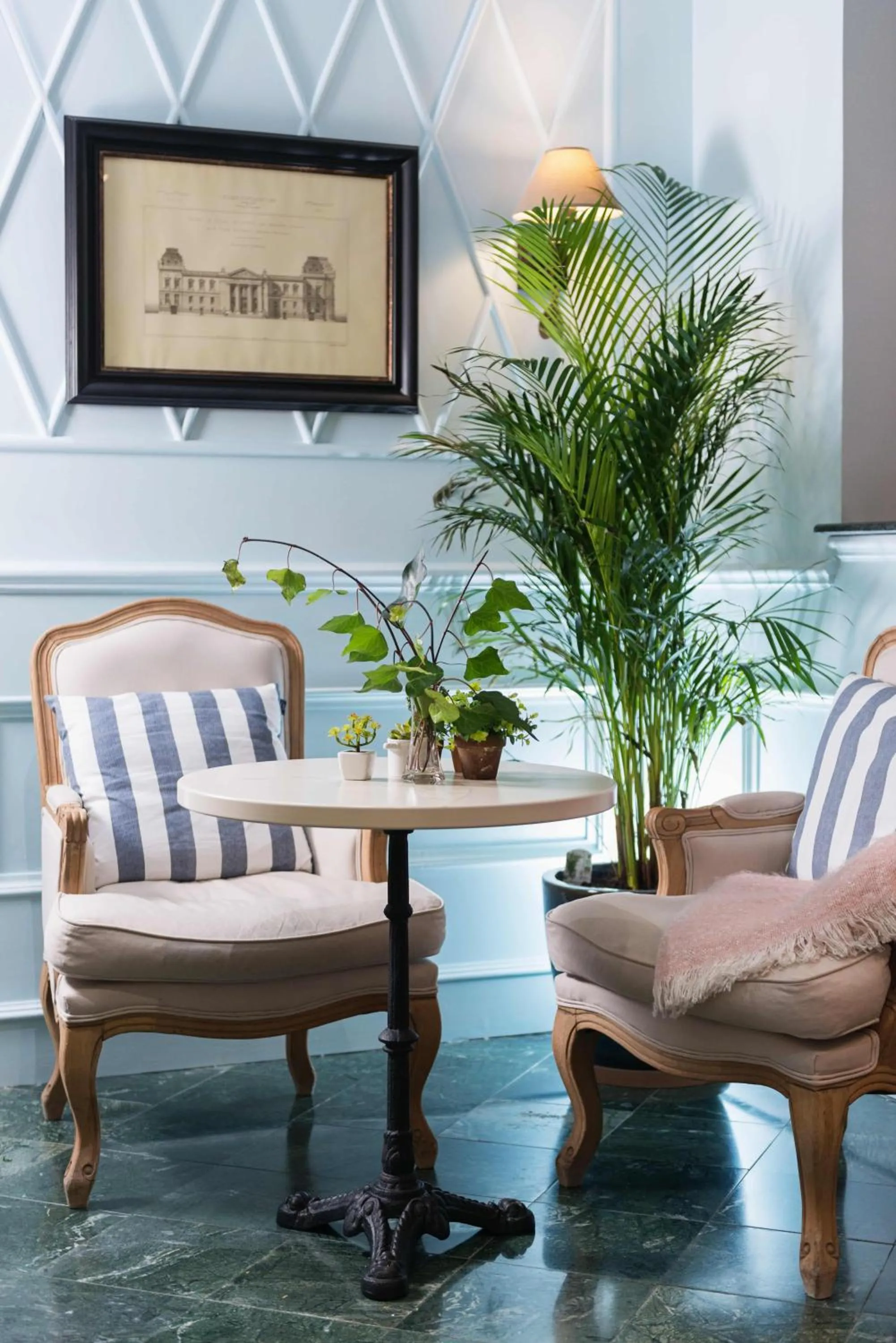 Communal lounge/ TV room in Areela Boutique Hotel