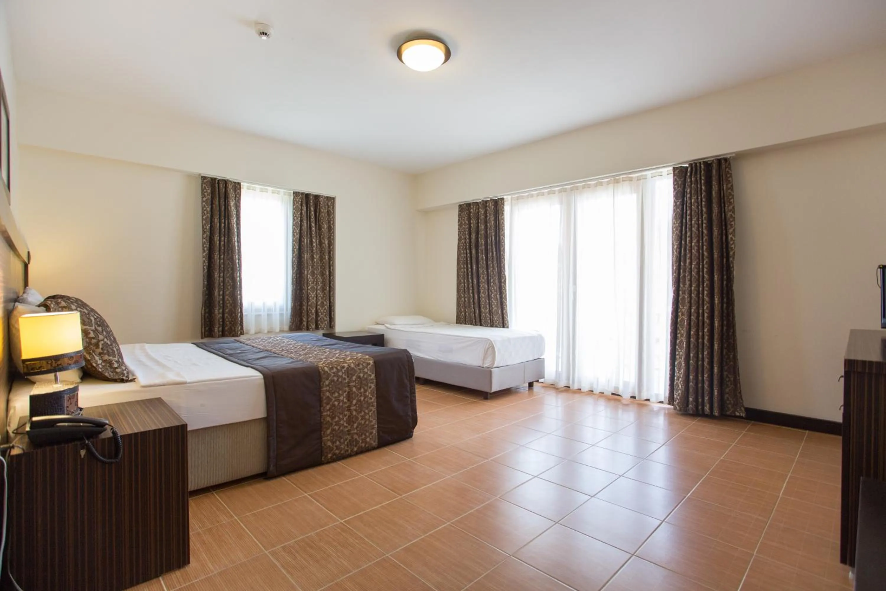 Bed in The One Club Hotel