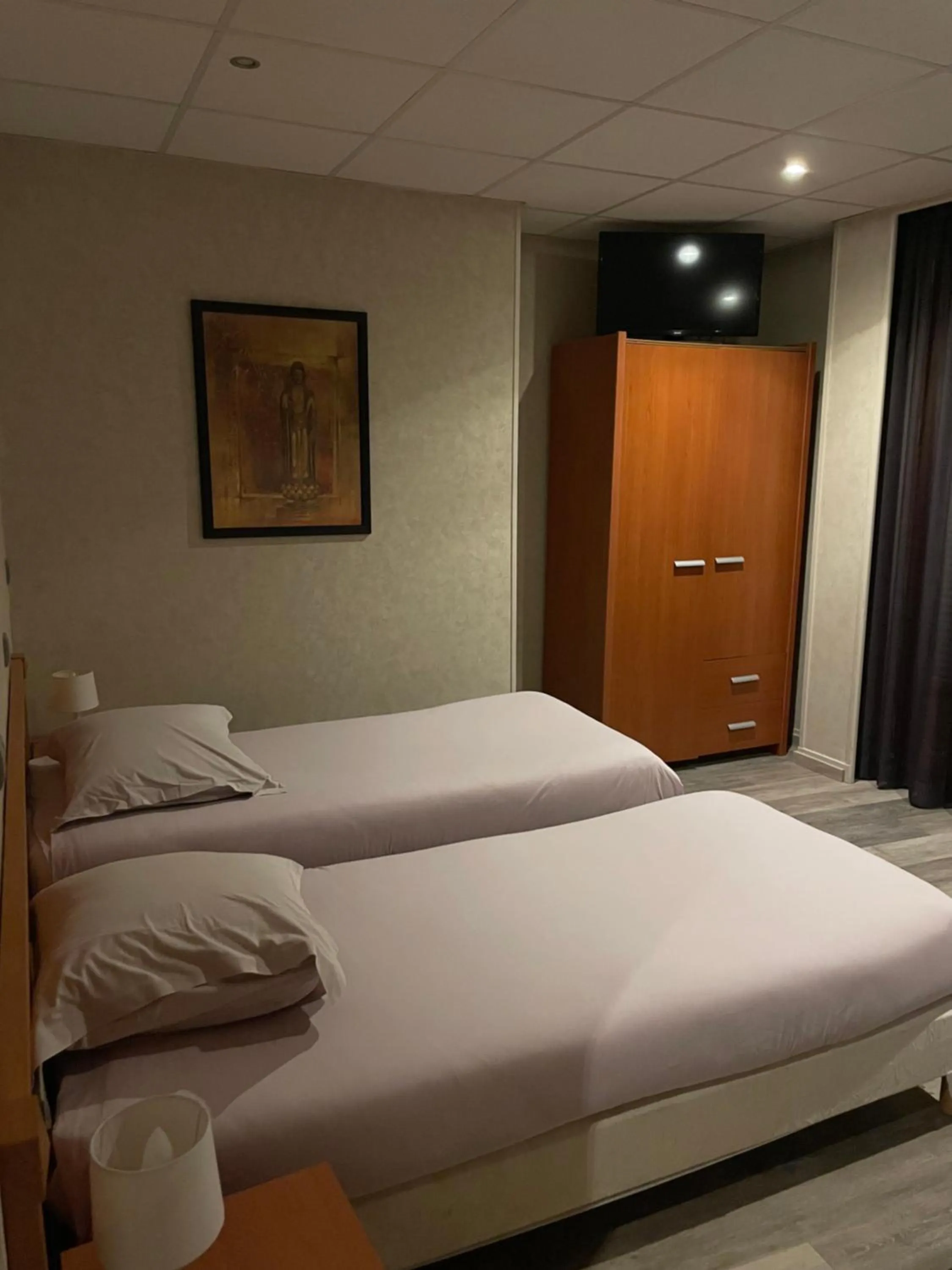 Bed in Hôtel de l'Europe