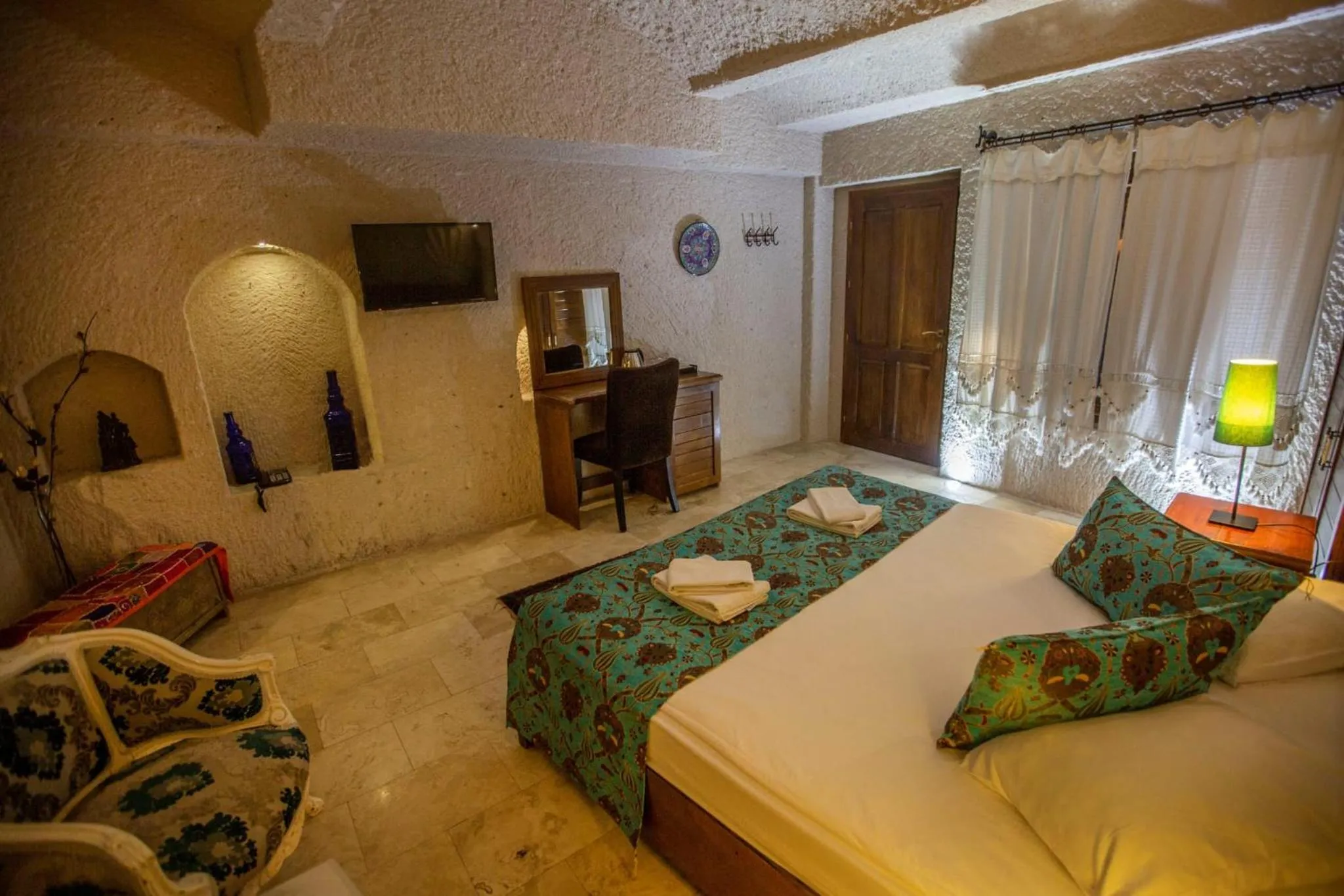 Bed in Hermes Cave Hotel