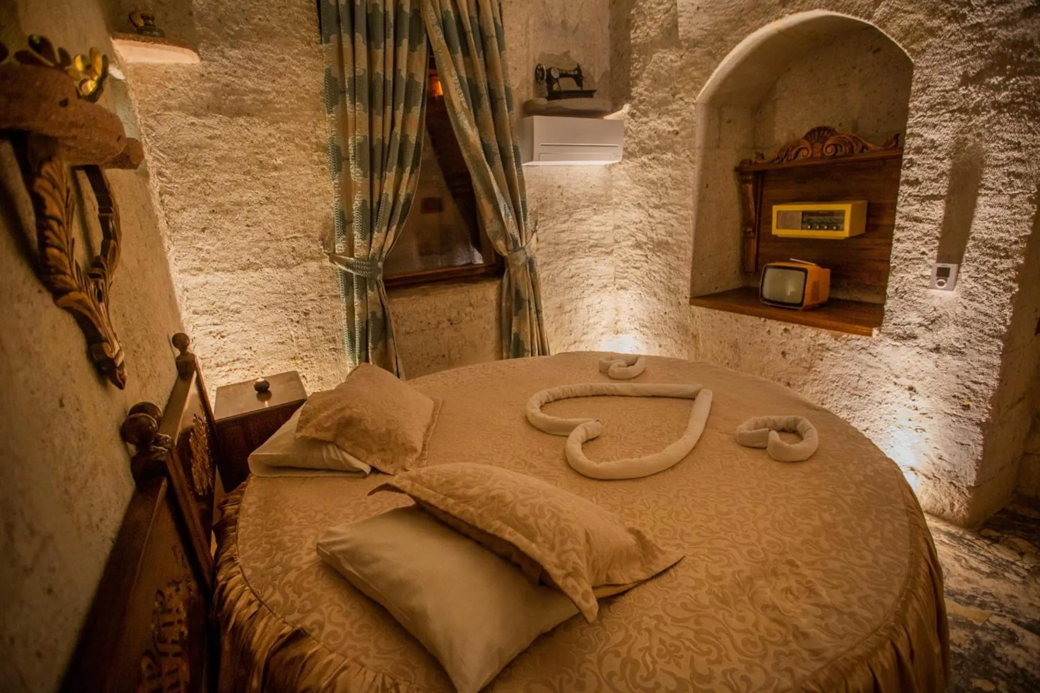 Bed in Hermes Cave Hotel