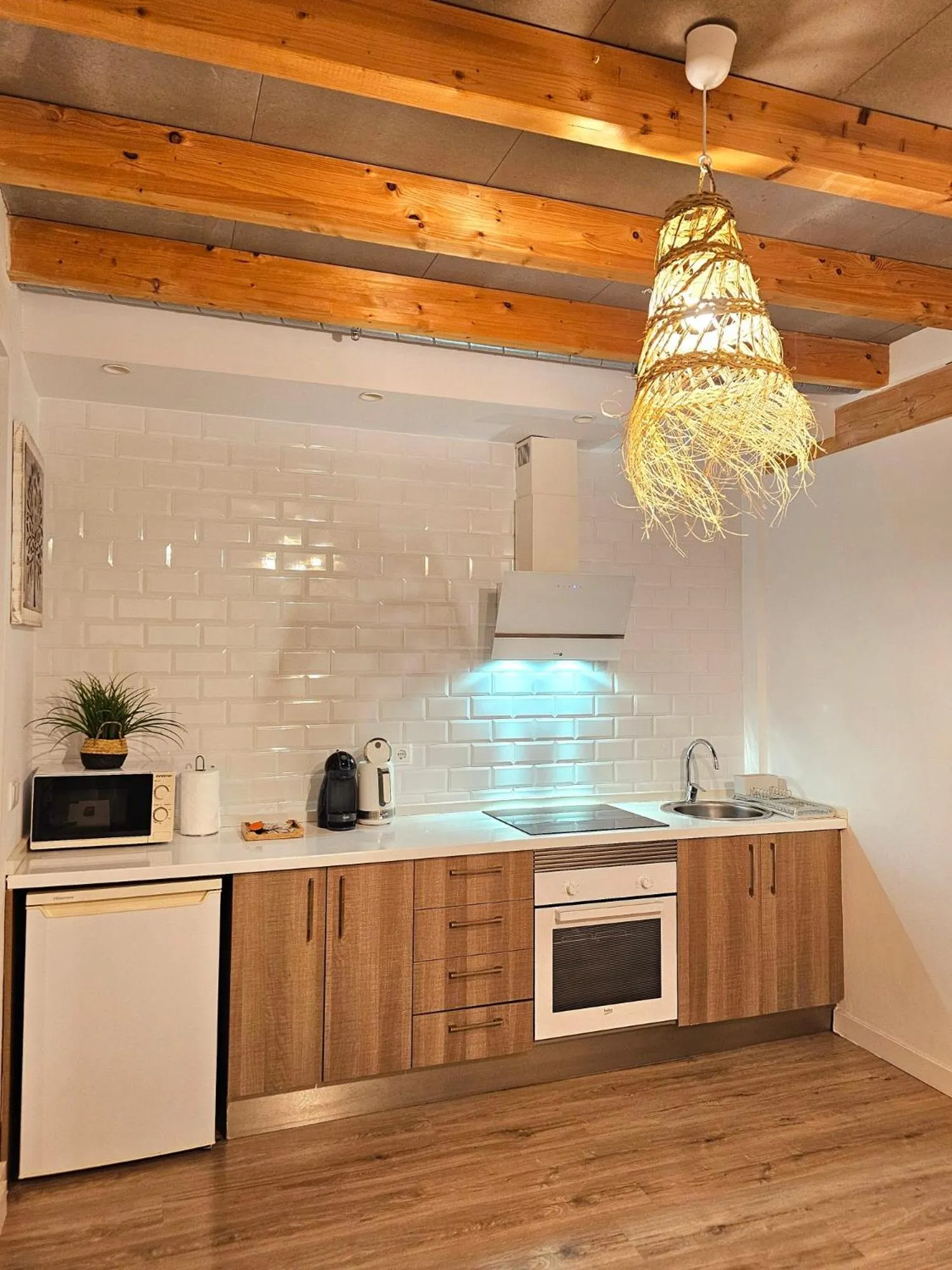 Kitchen or kitchenette in Apartamentos de la Huerta