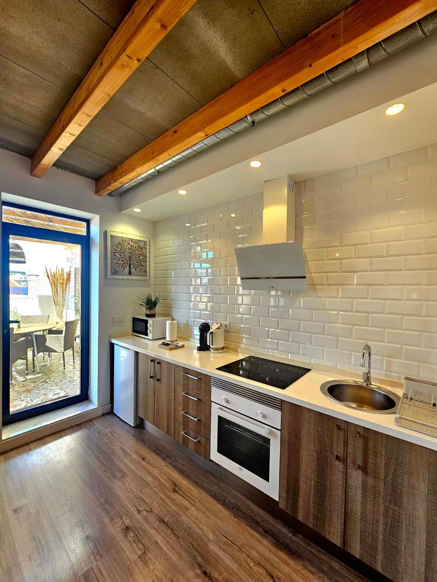 Kitchen or kitchenette in Apartamentos de la Huerta