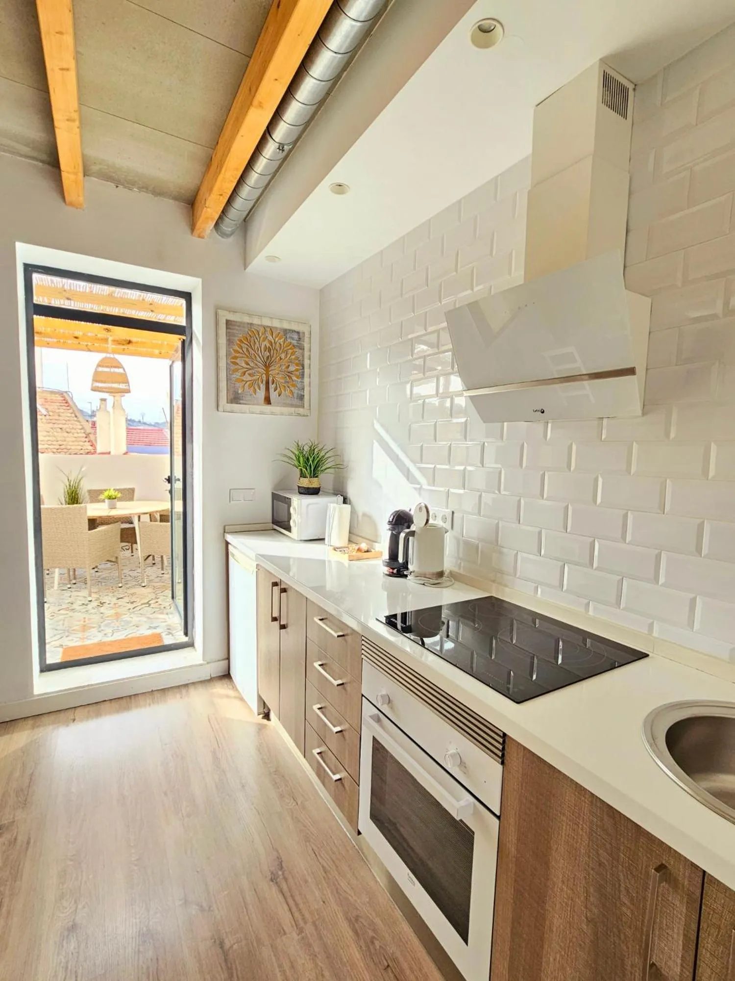 Kitchen or kitchenette in Apartamentos de la Huerta