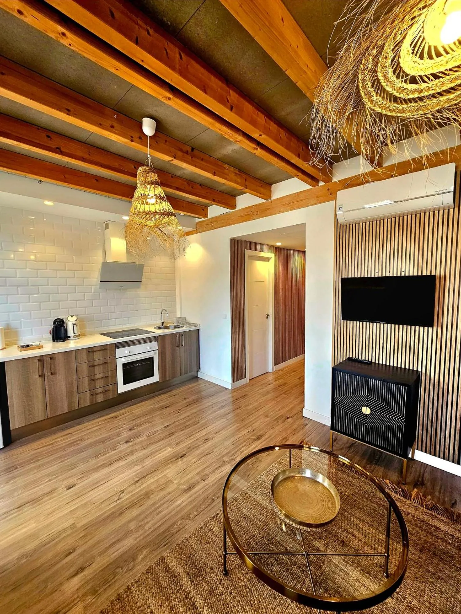 Kitchen or kitchenette in Apartamentos de la Huerta