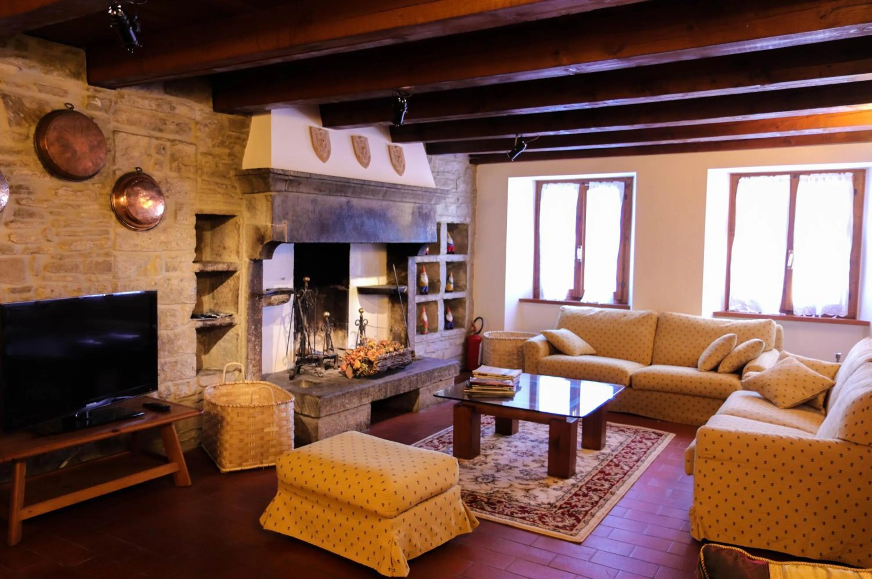 Communal lounge/ TV room in Il Palazzo Ridracoli