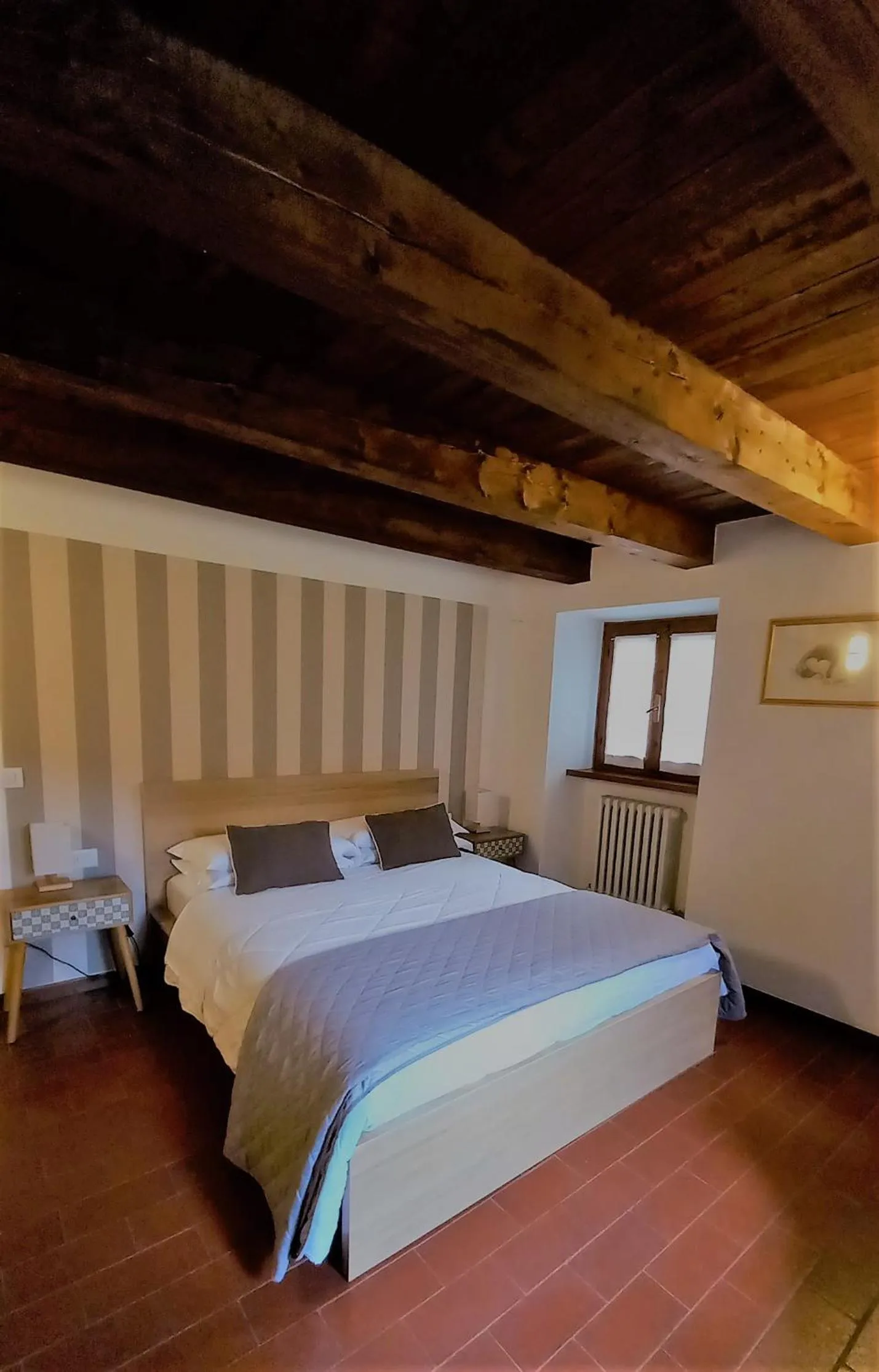 Photo of the whole room, Bed in Il Palazzo Ridracoli